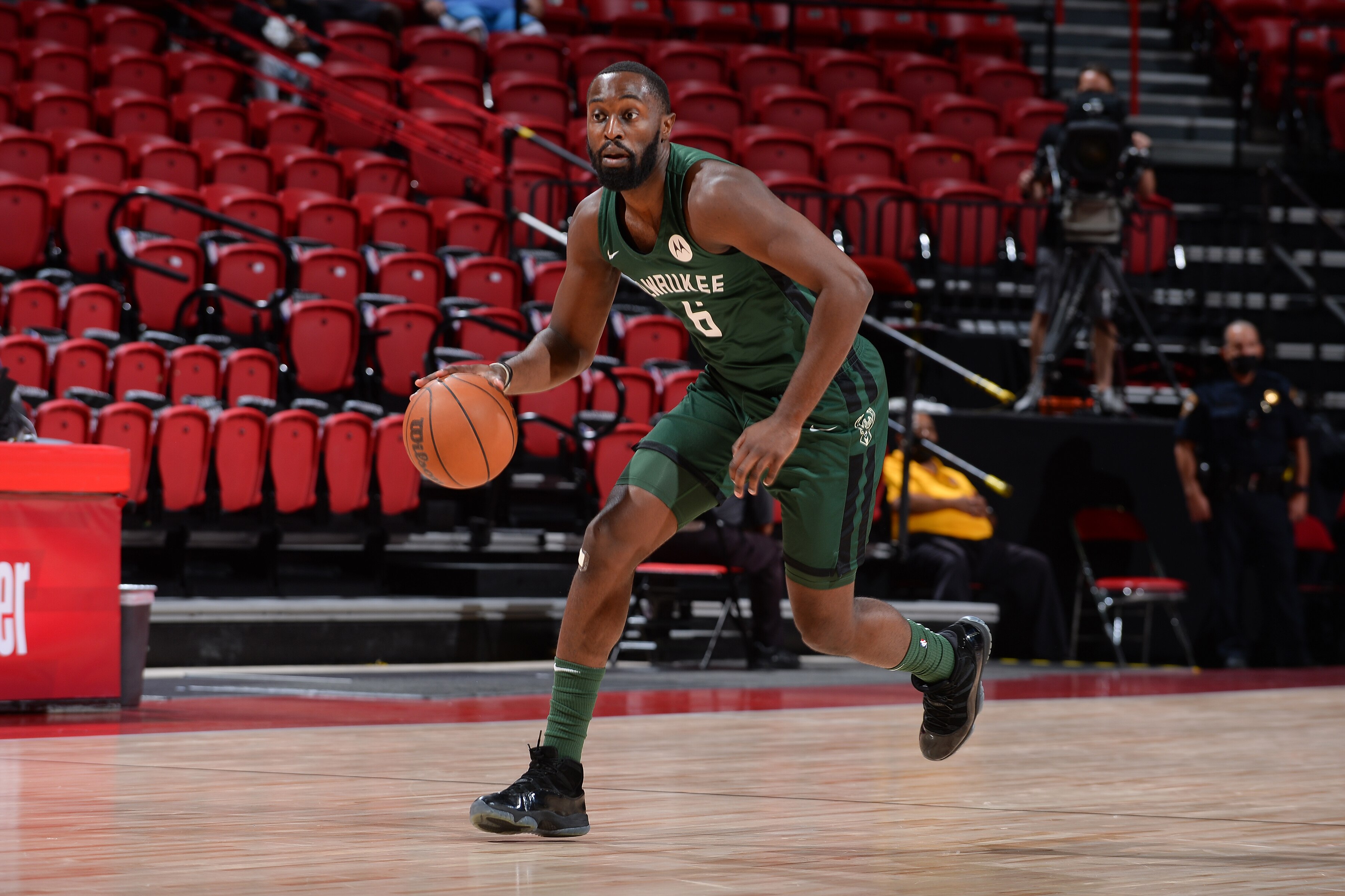 LAS VEGAS, NV - AUGUST 16: Theo Pinson #6 of the Milwaukee Bucks dribbles the ball against the Denver Nuggets during the 2021 Las Vegas Summer League on August 16, 2021 at the Thomas & Mack Center in Las Vegas, Nevada. NOTE TO USER: User expressly acknowledges and agrees that, by downloading and/or using this Photograph, user is consenting to the terms and conditions of the Getty Images License Agreement. Mandatory Copyright Notice: Copyright 2021 NBAE (Photo by Bart Young/NBAE via Getty Images)