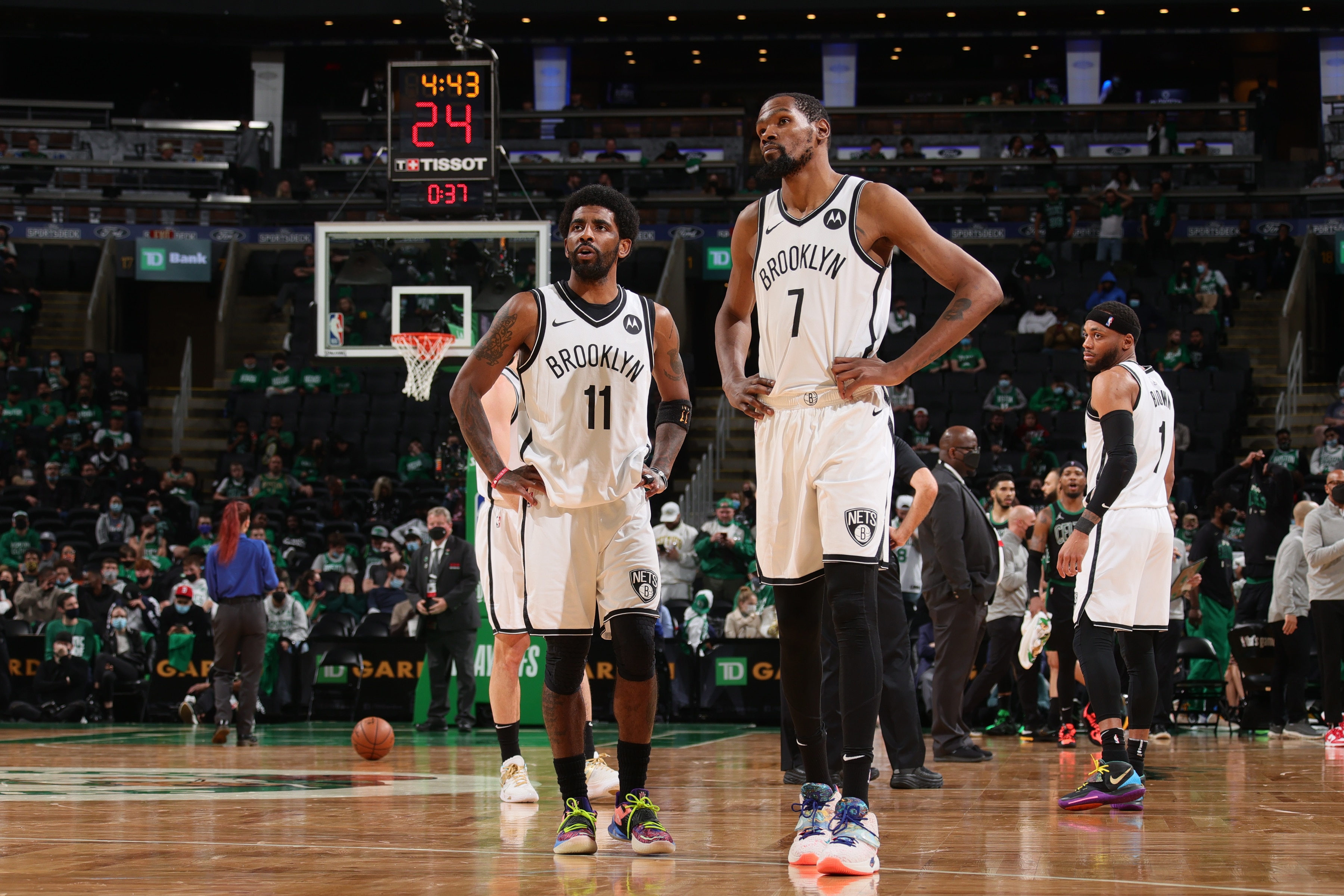 BOSTON, MA - MAY 28: Kevin Durant #7 and Kyrie Irving #11 of the Brooklyn Nets look on during Round 1, Game 3 of the 2021 NBA Playoffs on May 28, 2021 at the TD Garden in Boston, Massachusetts.  NOTE TO USER: User expressly acknowledges and agrees that, by downloading and or using this photograph, User is consenting to the terms and conditions of the Getty Images License Agreement. Mandatory Copyright Notice: Copyright 2021 NBAE  (Photo by Nathaniel S. Butler/NBAE via Getty Images)