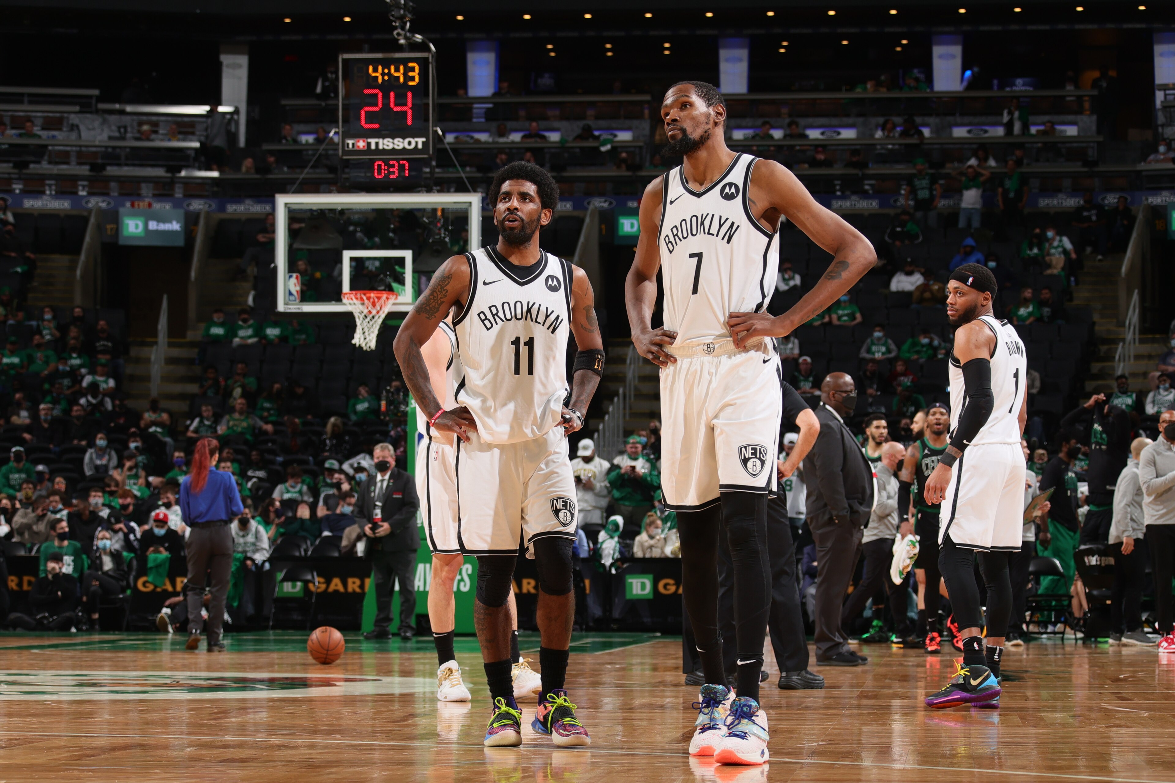 BOSTON, MA - MAY 28: Kevin Durant #7 and Kyrie Irving #11 of the Brooklyn Nets look on during Round 1, Game 3 of the 2021 NBA Playoffs on May 28, 2021 at the TD Garden in Boston, Massachusetts.  NOTE TO USER: User expressly acknowledges and agrees that, by downloading and or using this photograph, User is consenting to the terms and conditions of the Getty Images License Agreement. Mandatory Copyright Notice: Copyright 2021 NBAE  (Photo by Nathaniel S. Butler/NBAE via Getty Images)