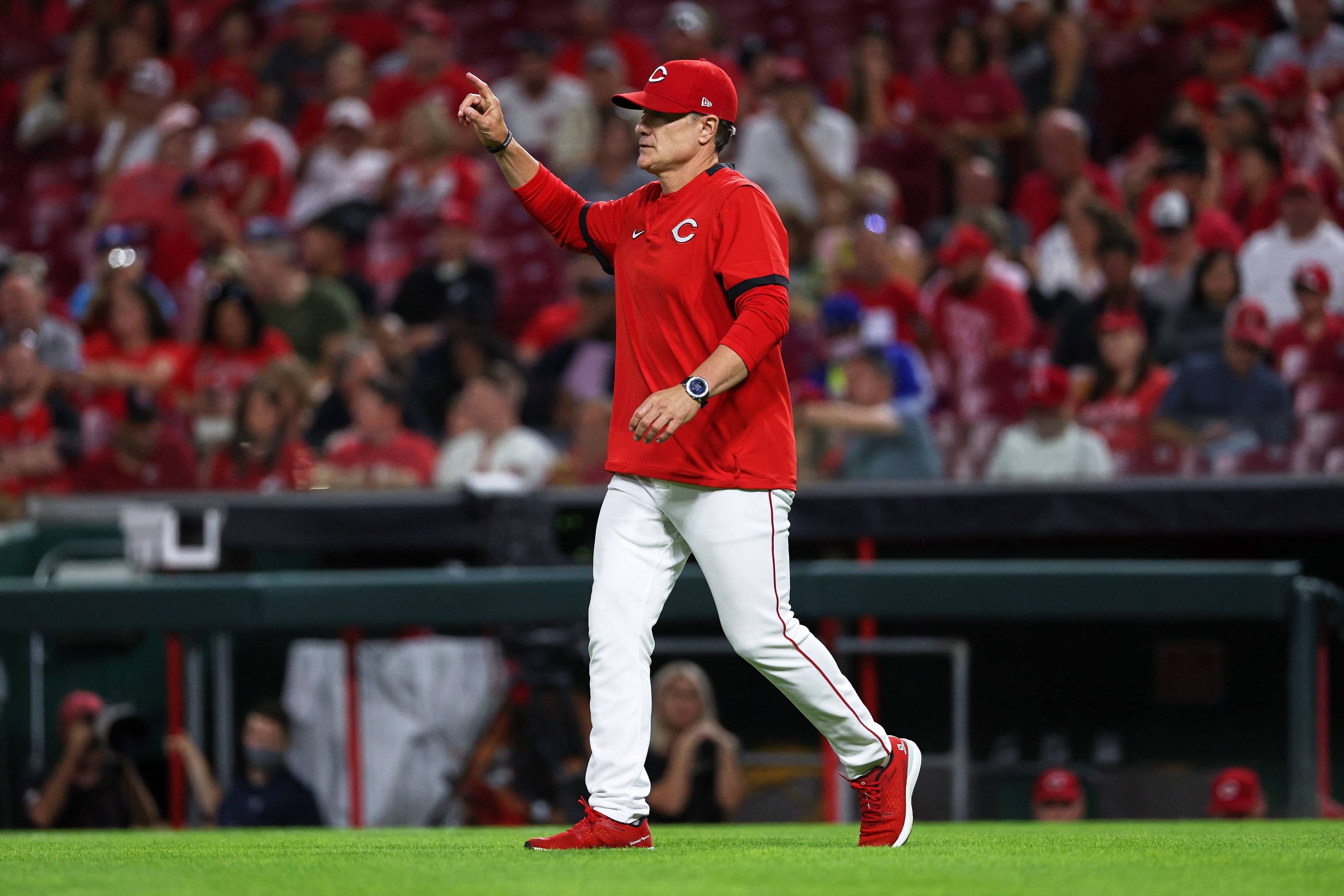 CINCINNATI, OHIO - SEPTEMBER 03: Manager David Bell of the Cincinnati Reds signals to make a pitching change in the sixth inning against the Detroit Tigers at Great American Ball Park on September 03, 2021 in Cincinnati, Ohio. (Photo by Dylan Buell/Getty Images)