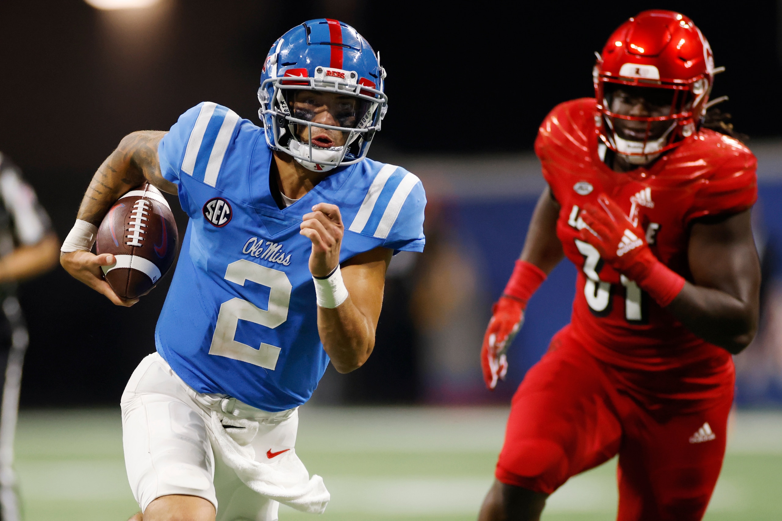 ATLANTA, GA - SEPTEMBER 06: Mississippi Rebels quarterback Matt Corral (2) runs with the ball during the Chick-Fil-A Kickoff game against the Louisville Cardinals on Sept. 6, 2021 at Mercedes-Benz Stadium in Atlanta, Georgia. (Photo by Joe Robbins/Icon Sportswire via Getty Images)
