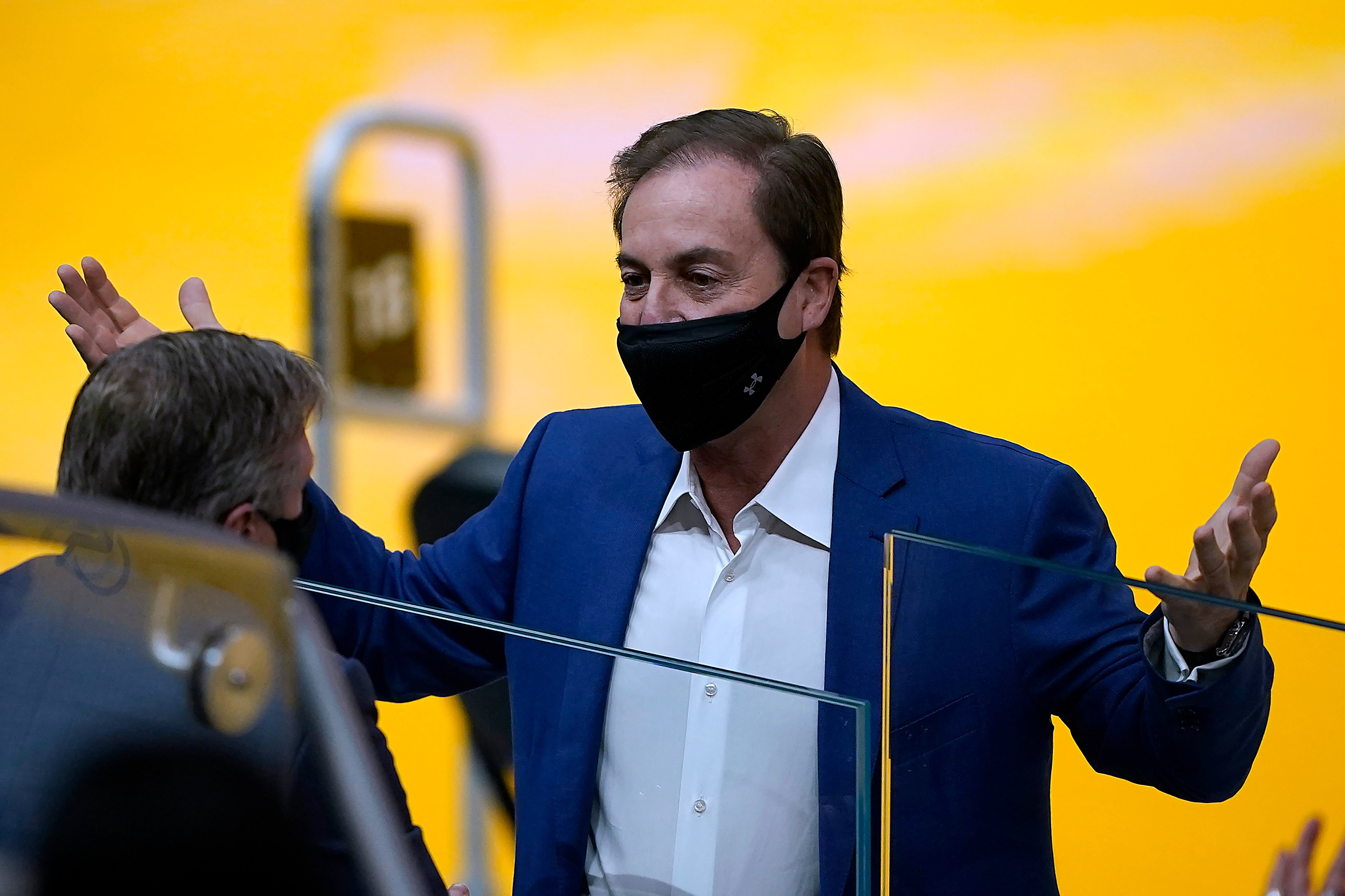 Golden State Warriors' owner Joe Lacob, right, talks with team president and chief operating officer Rick Welts before an NBA basketball game against the Portland Trail Blazers in San Francisco, Sunday, Jan. 3, 2021. (AP Photo/Tony Avelar)