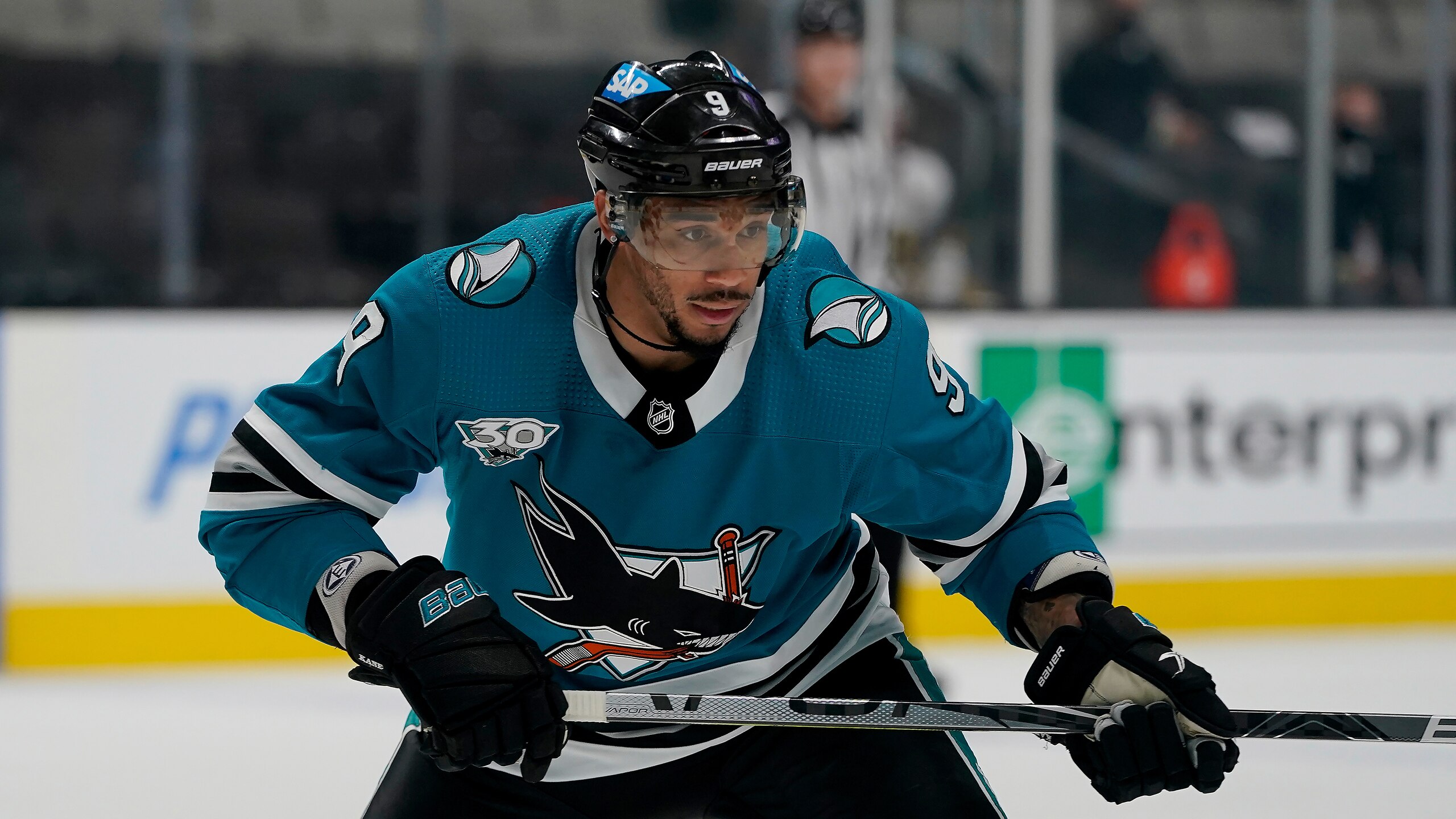 San Jose Sharks left wing Evander Kane (9) against the Vegas Golden Knights during an NHL hockey game in San Jose, Calif., Wednesday, May 12, 2021. (AP Photo/Jeff Chiu) San Jose Sharks left wing Evander Kane (9) against the Vegas Golden Knights during an NHL hockey game in San Jose, Calif., Wednesday, May 12, 2021. (AP Photo/Jeff Chiu)