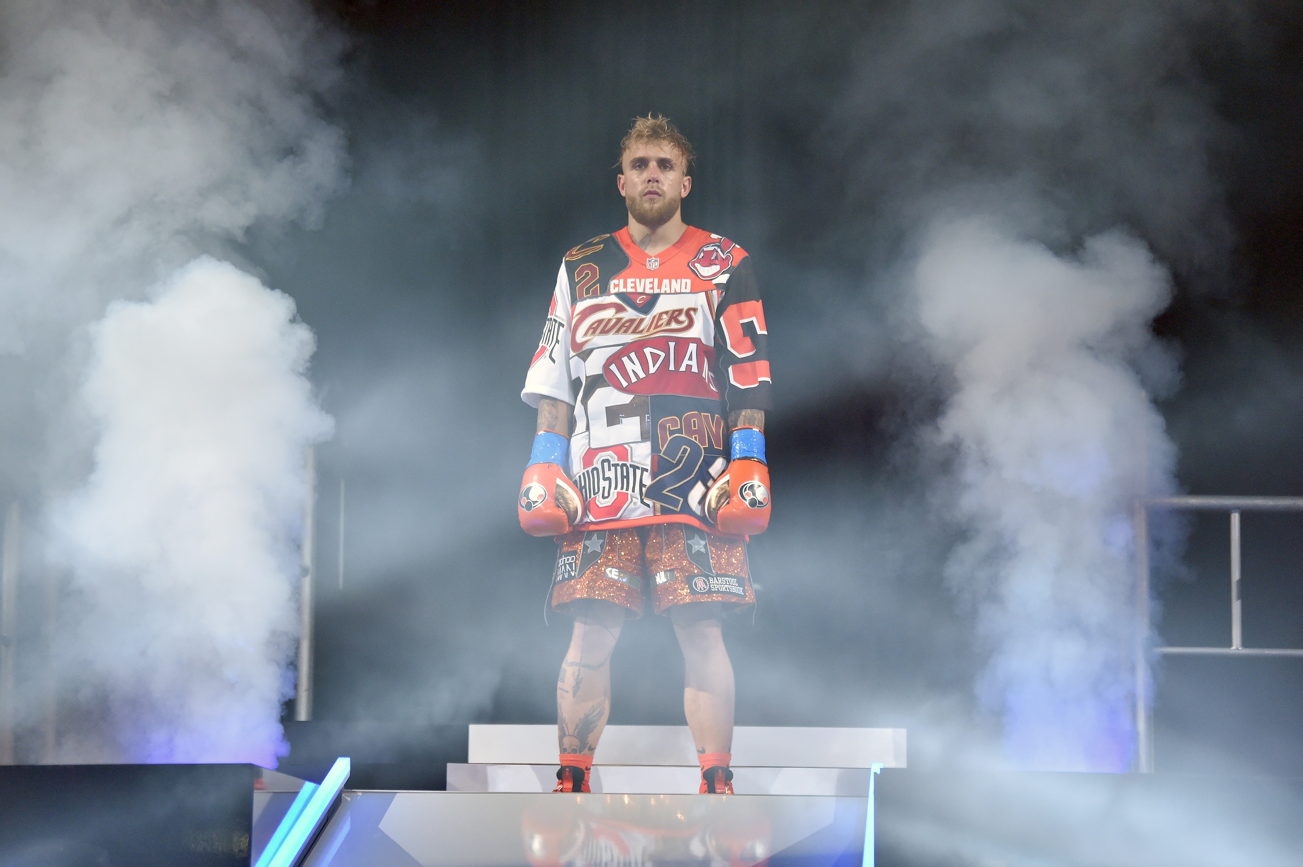 CLEVELAND, OHIO - AUGUST 29: Jake Paul enters the arena prior to the fight against Tyron Woodley in their cruiserweight bout during a Showtime pay-per-view event at Rocket Morgage Fieldhouse on August 29, 2021 in Cleveland, Ohio. (Photo by Jason Miller/Getty Images) CLEVELAND, OHIO - AUGUST 29: Jake Paul enters the arena prior to the fight against Tyron Woodley in their cruiserweight bout during a Showtime pay-per-view event at Rocket Morgage Fieldhouse on August 29, 2021 in Cleveland, Ohio. (Photo by Jason Miller/Getty Images)