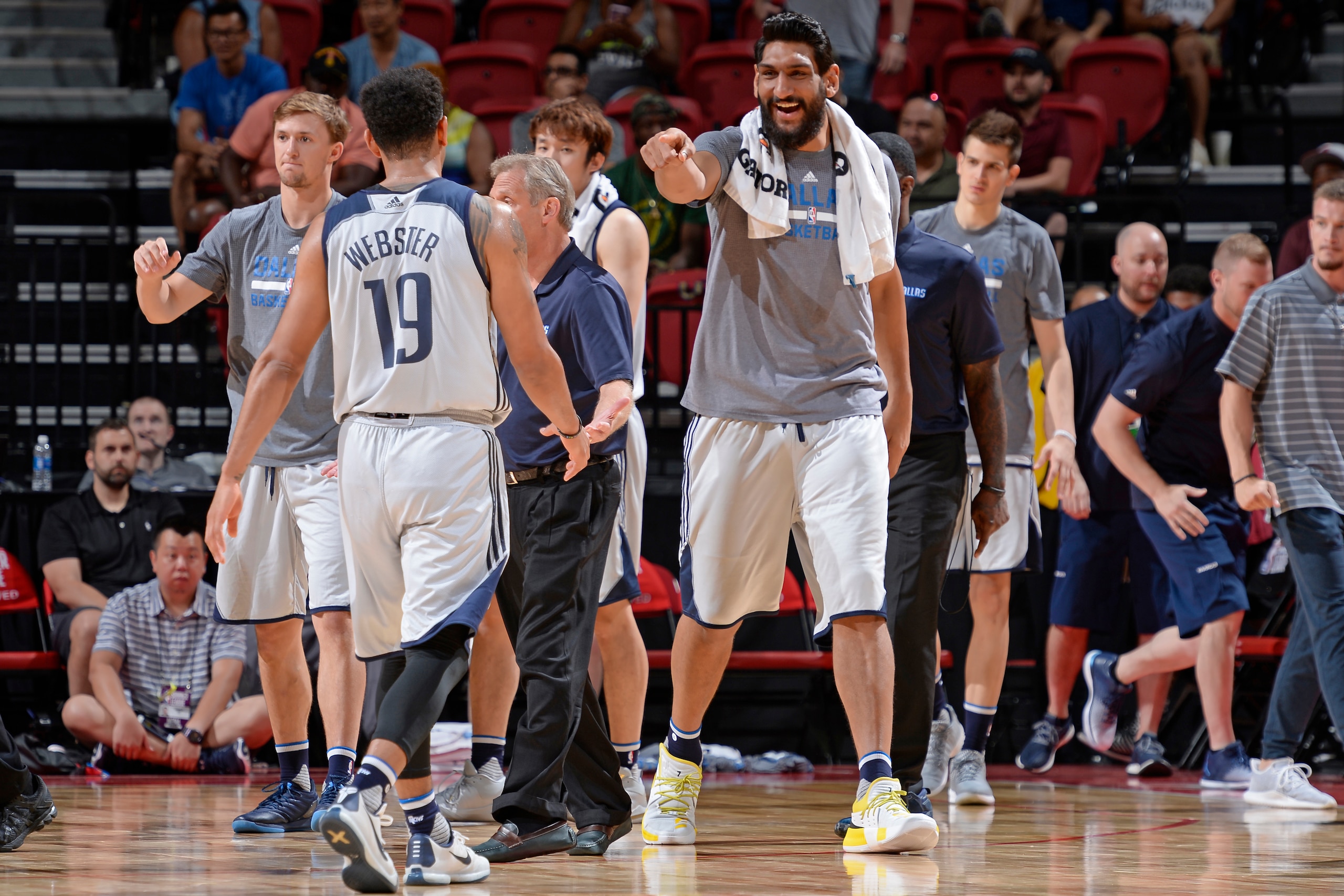 LAS VEGAS, NV - JULY 16:  Satnam Singh #52 of the Dallas Mavericks high fives teammates during the Semifinals of the 2017 Las Vegas Summer League against the Los Angeles Lakers on July 16, 2017 at the Thomas & Mack Center in Las Vegas, Nevada. NOTE TO USER: User expressly acknowledges and agrees that, by downloading and or using this Photograph, user is consenting to the terms and conditions of the Getty Images License Agreement. Mandatory Copyright Notice: Copyright 2017 NBAE (Photo by David Dow/NBAE via Getty Images)