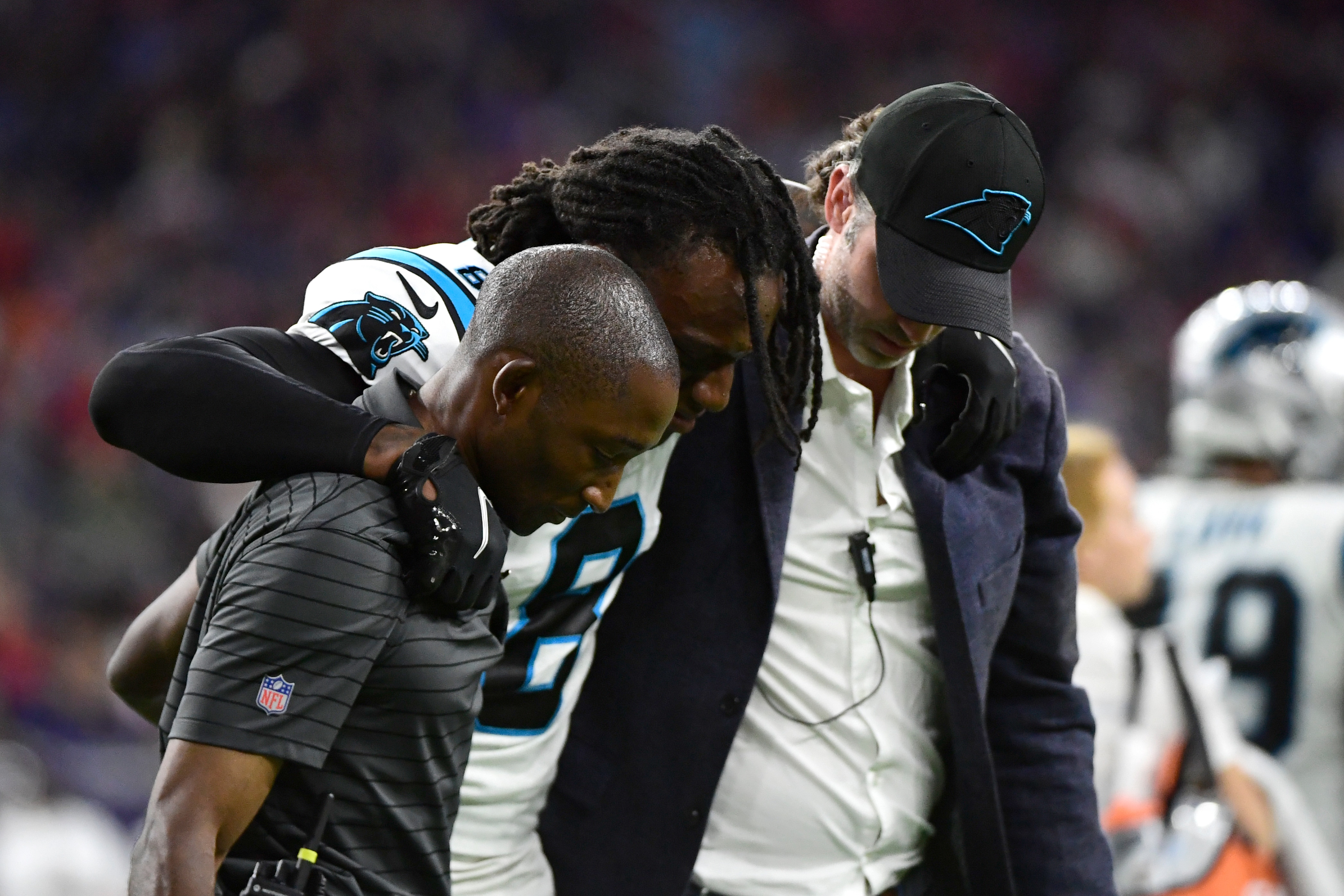 Carolina Panthers cornerback Jaycee Horn (8) is helped off the field after an injury during the second half of an NFL football game against the Houston Texans Thursday, Sept. 23, 2021, in Houston. (AP Photo/Justin Rex)