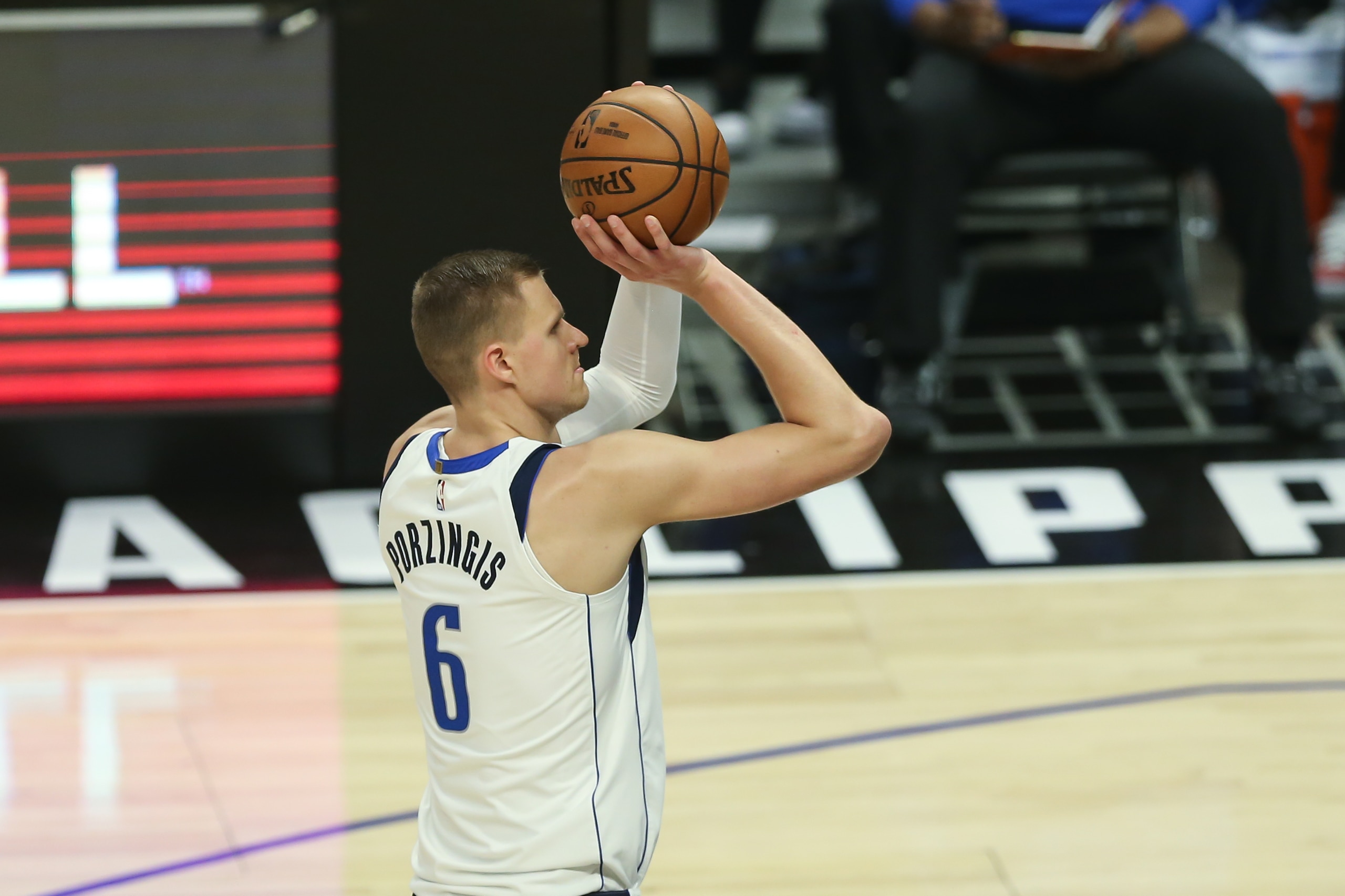LOS ANGELES, CA - JUNE 06: Dallas Mavericks center Kristaps Porzingis (6) shoots during game 7 of the first round of the NBA Western Conference Playoffs between the Dallas Mavericks and the Los Angeles Clippers on June 06, 2021, at Staples Center in Los Angeles, CA. (Photo by Jevone Moore/Icon Sportswire via Getty Images) LOS ANGELES, CA - JUNE 06: Dallas Mavericks center Kristaps Porzingis (6) shoots during game 7 of the first round of the NBA Western Conference Playoffs between the Dallas Mavericks and the Los Angeles Clippers on June 06, 2021, at Staples Center in Los Angeles, CA. (Photo by Jevone Moore/Icon Sportswire via Getty Images)