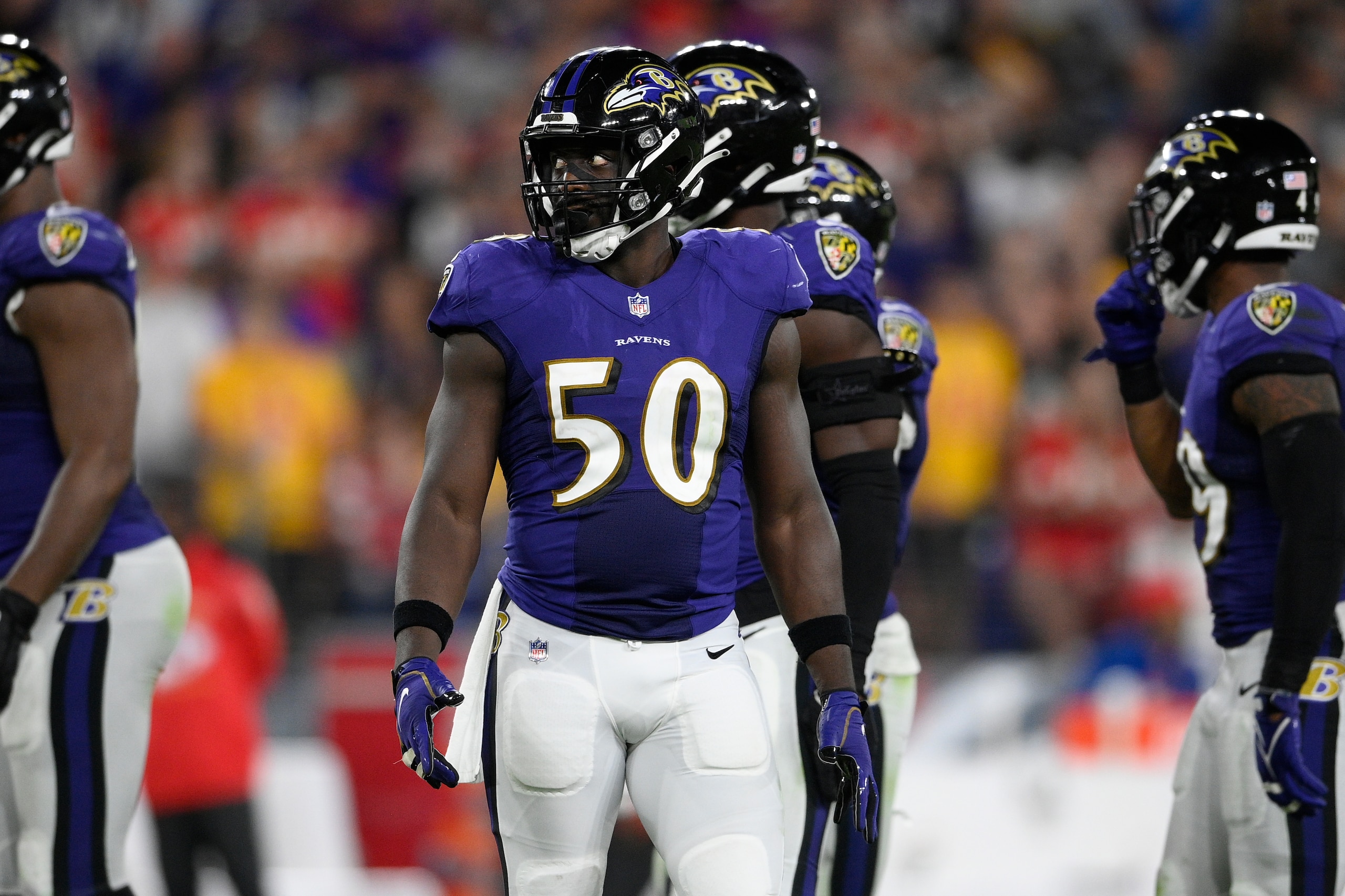 Baltimore Ravens linebacker Justin Houston (50) stands on the field in the second half of an NFL football game against the Kansas City Chiefs, Sunday, Sept. 19, 2021, in Baltimore. (AP Photo/Nick Wass)