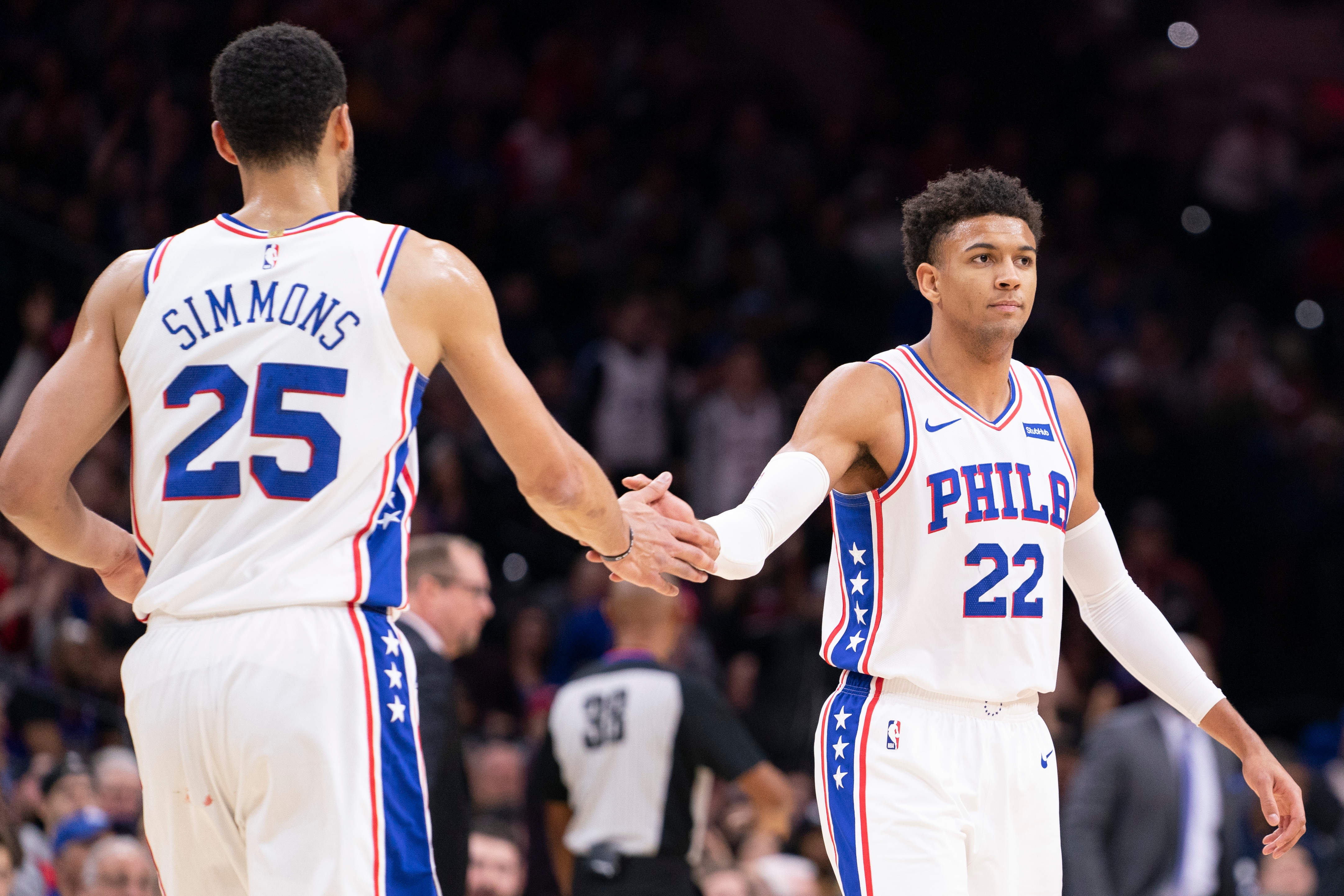 PHILADELPHIA, PA - DECEMBER 08: Ben Simmons #25 and Matisse Thybulle #22 of the Philadelphia 76ers react against the Toronto Raptors at Wells Fargo Center on December 8, 2019 in Philadelphia, Pennsylvania. NOTE TO USER: User expressly acknowledges and agrees that, by downloading and/or using this photograph, user is consenting to the terms and conditions of the Getty Images License Agreement. (Photo by Mitchell Leff/Getty Images)