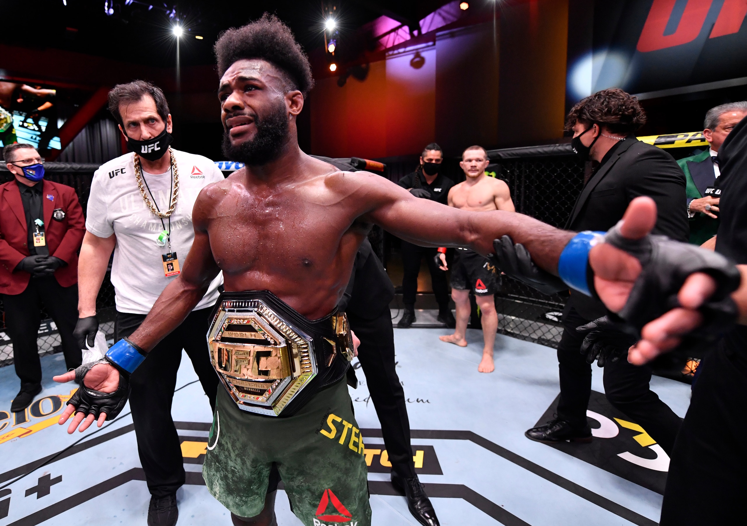 LAS VEGAS, NEVADA - MARCH 06: Aljamain Sterling reacts after his victory by disqualification over Petr Yan of Russia due to an intentional foul in their UFC bantamweight championship fight during the UFC 259 event at UFC APEX on March 06, 2021 in Las Vegas, Nevada. (Photo by Jeff Bottari/Zuffa LLC)