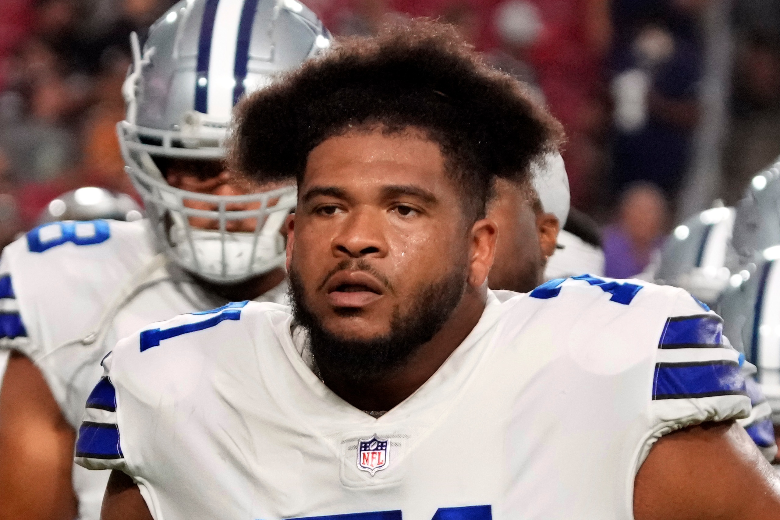 FILE - In this Aug. 13, 2021, file photo, Dallas Cowboys offensive tackle La'el Collins (71) walks off the field during a preseason NFL football game against the Arizona Cardinals in Glendale, Ariz. Collins has been suspended without pay for the next five games for violating the NFL Policy on Substances of Abuse, the NFL announced Friday, Sept. 10, 2021. (AP Photo/Rick Scuteri, File)