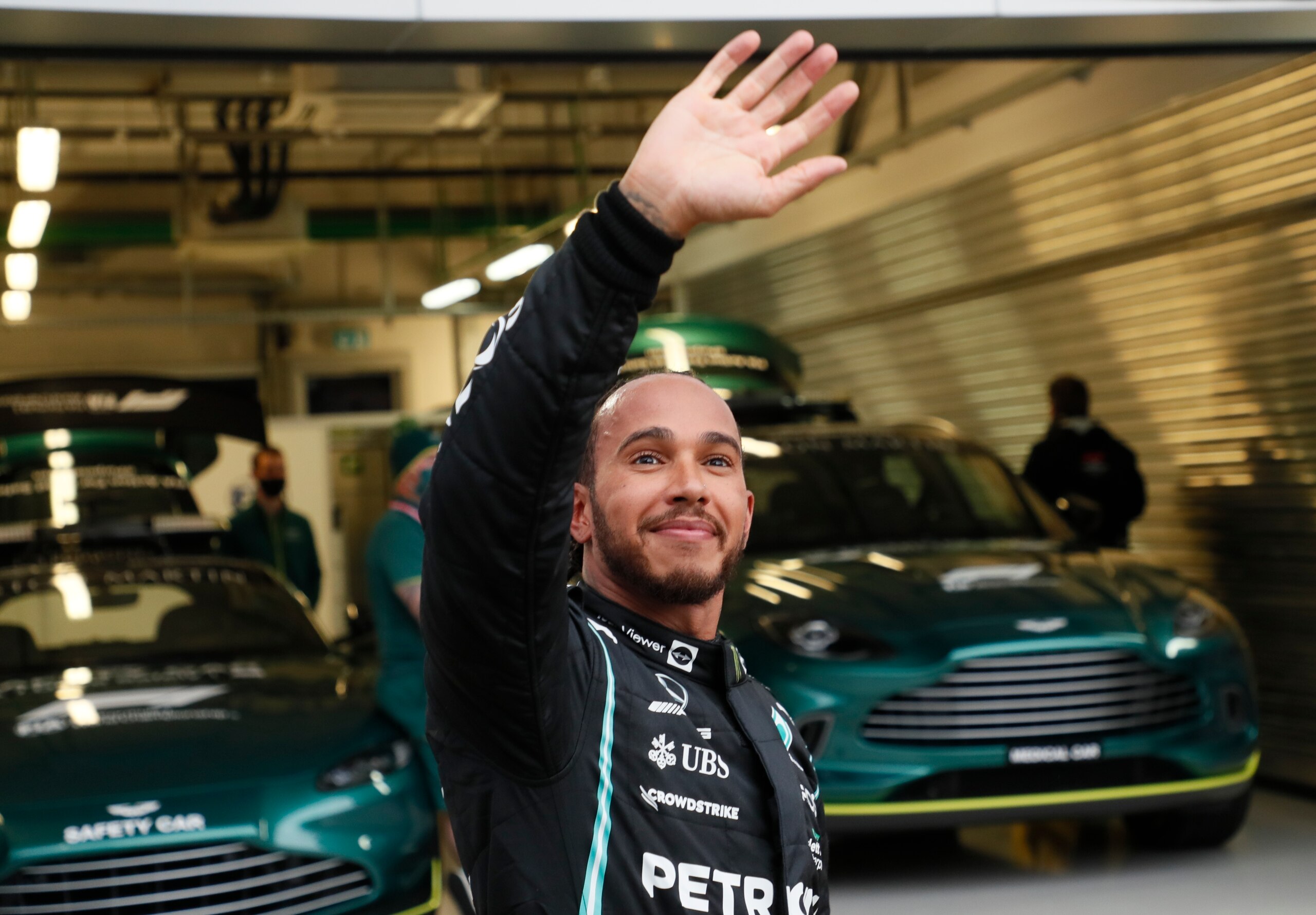 Mercedes driver Lewis Hamilton of Britain reacts after wining the Russian Formula One Grand Prix at the Sochi Autodrom circuit, in Sochi, Russia, Sunday, Sept. 26, 2021. (Yuri Kochetkov/Pool Photo via AP)