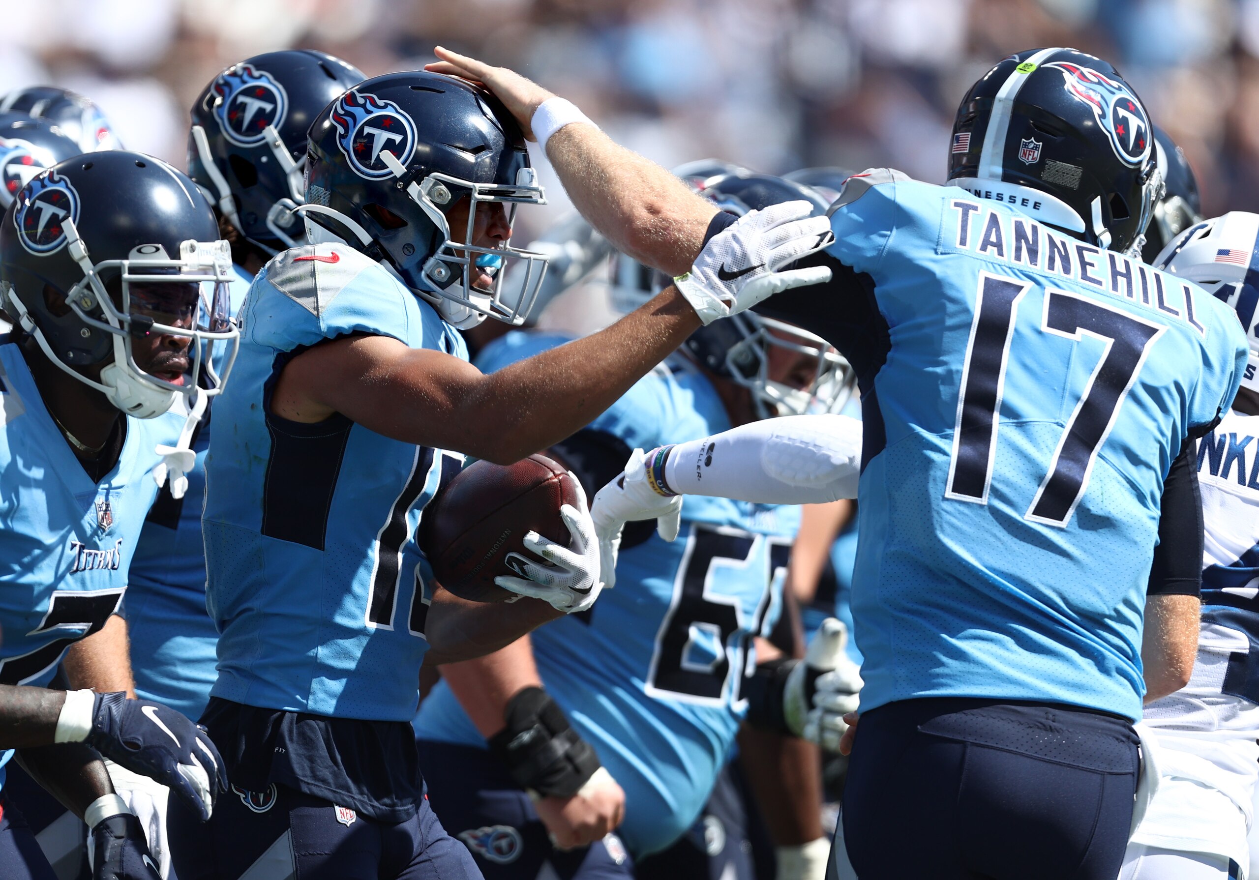 NASHVILLE, TENNESSEE - SEPTEMBER 26: Nick Westbrook-Ikhine #15 of the Tennessee Titans celebrates with Ryan Tannehill #17 after Westbrook-Ikhine scored a touchdown against the Indianapolis Colts in the second quarter of the game at Nissan Stadium on September 26, 2021 in Nashville, Tennessee. (Photo by Silas Walker/Getty Images)