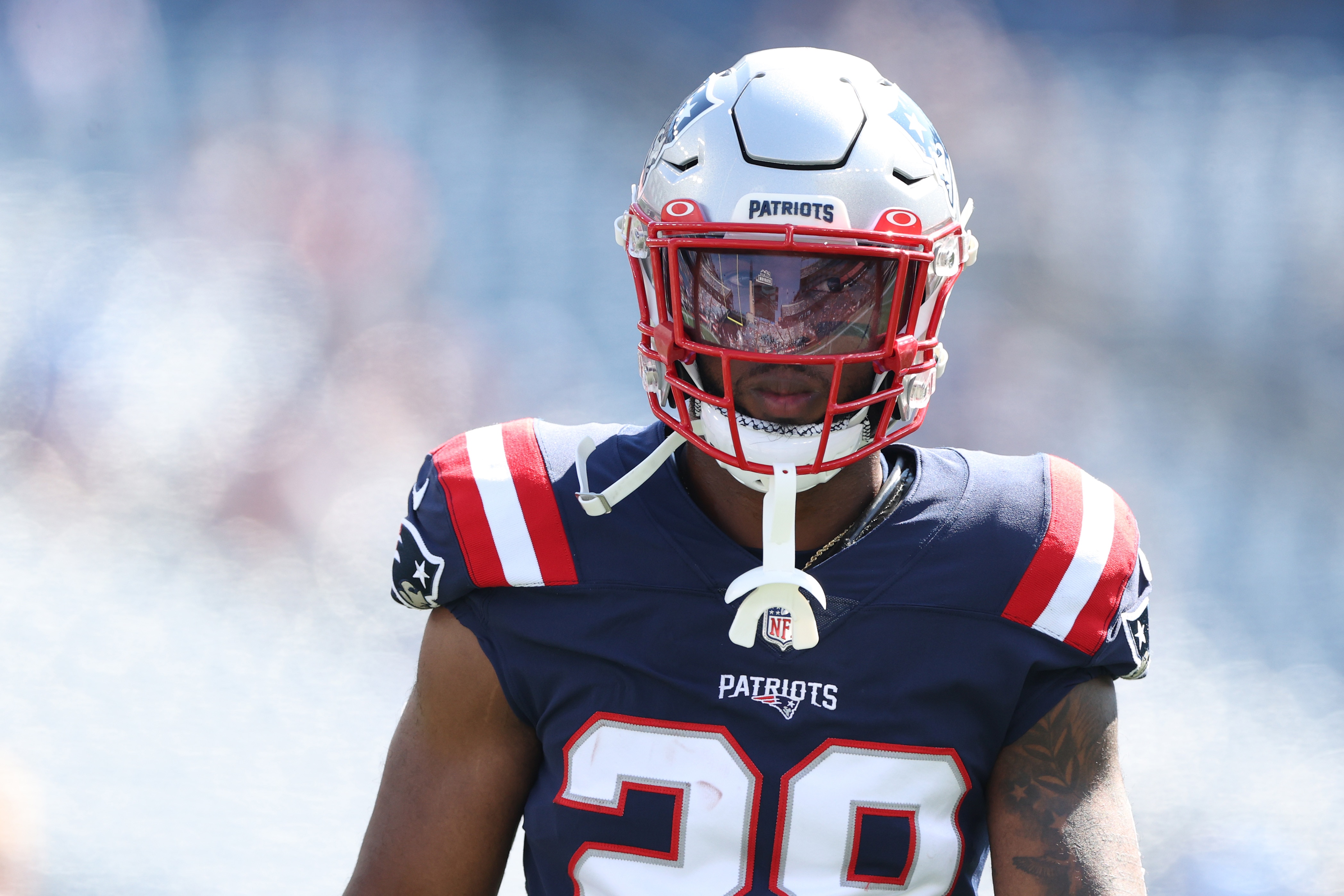 FOXBOROUGH, MASSACHUSETTS - SEPTEMBER 26: James White #28 of the New England Patriots warms up before the game against the New Orleans Saints at Gillette Stadium on September 26, 2021 in Foxborough, Massachusetts. (Photo by Elsa/Getty Images)