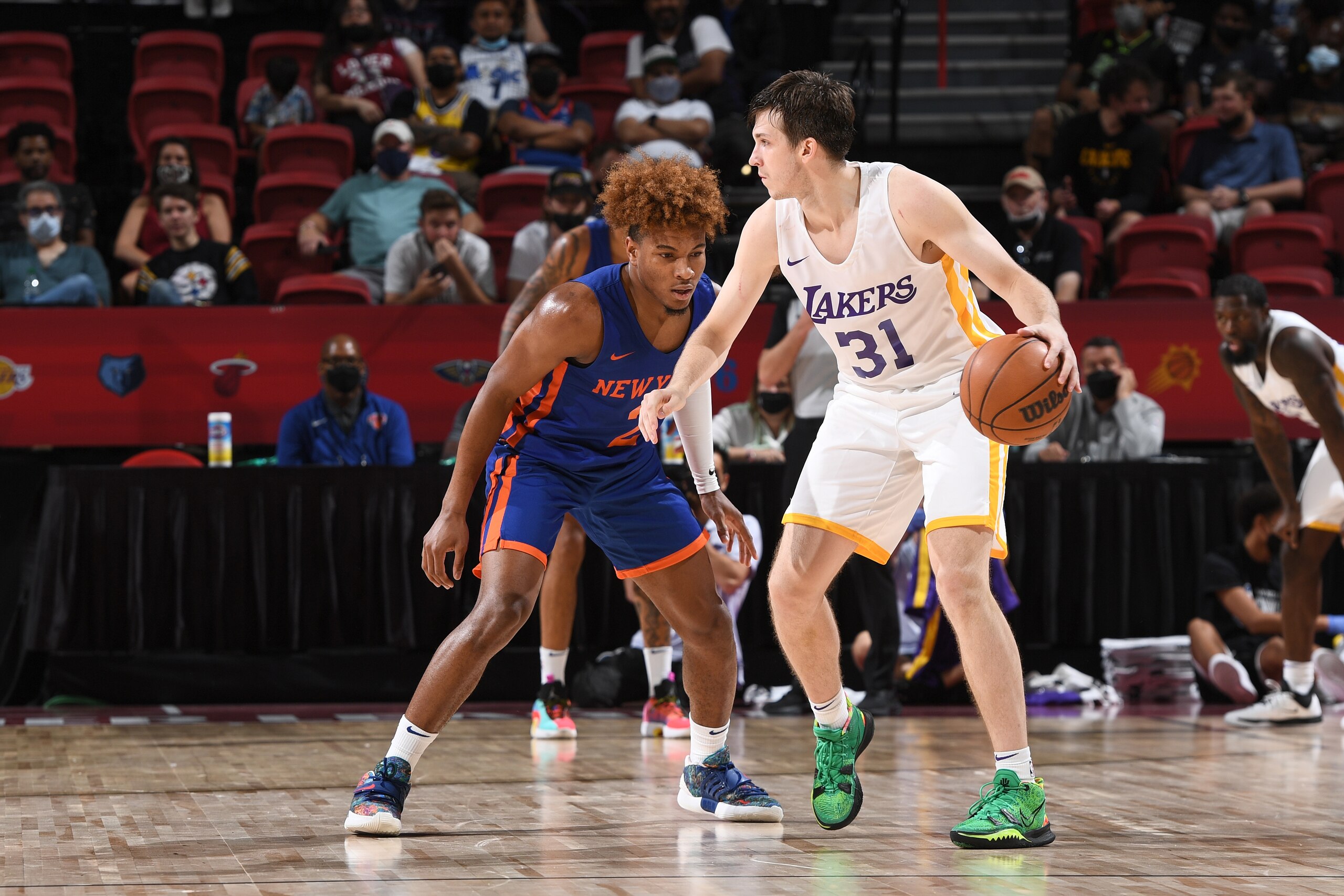LAS VEGAS, NV - AUGUST 11: Austin Reaves #31 of the Los Angeles Lakers dribbles during the game against the New York Knicks during the 2021 Las Vegas Summer League on August 11, 2021 at the Thomas & Mack Center in Las Vegas, Nevada. NOTE TO USER: User expressly acknowledges and agrees that, by downloading and/or using this Photograph, user is consenting to the terms and conditions of the Getty Images License Agreement. Mandatory Copyright Notice: Copyright 2021 NBAE (Photo by Garrett Ellwood/NBAE via Getty Images)