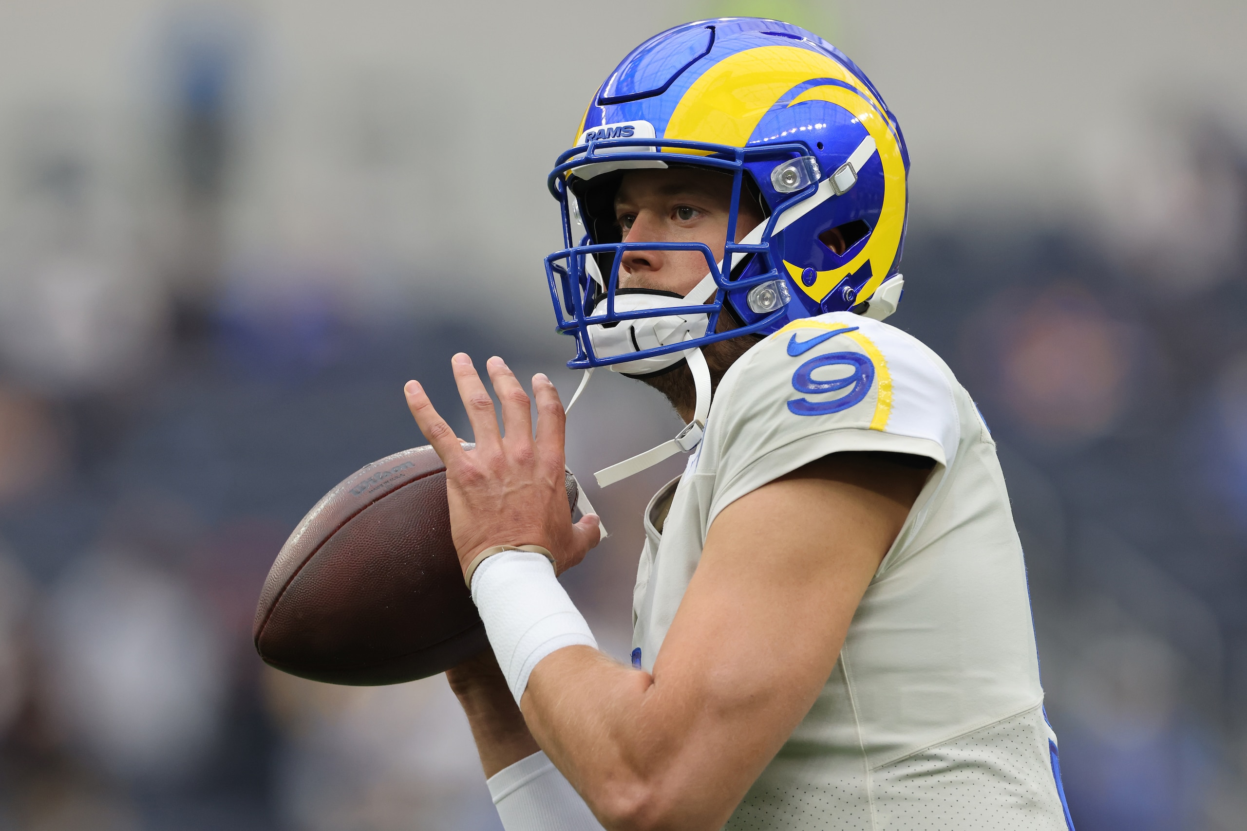 INGLEWOOD, CALIFORNIA - SEPTEMBER 26: Matthew Stafford #9 of the Los Angeles Rams throws the ball during pregame warm-ups before the game against the Tampa Bay Buccaneers at SoFi Stadium on September 26, 2021 in Inglewood, California. (Photo by Harry How/Getty Images)