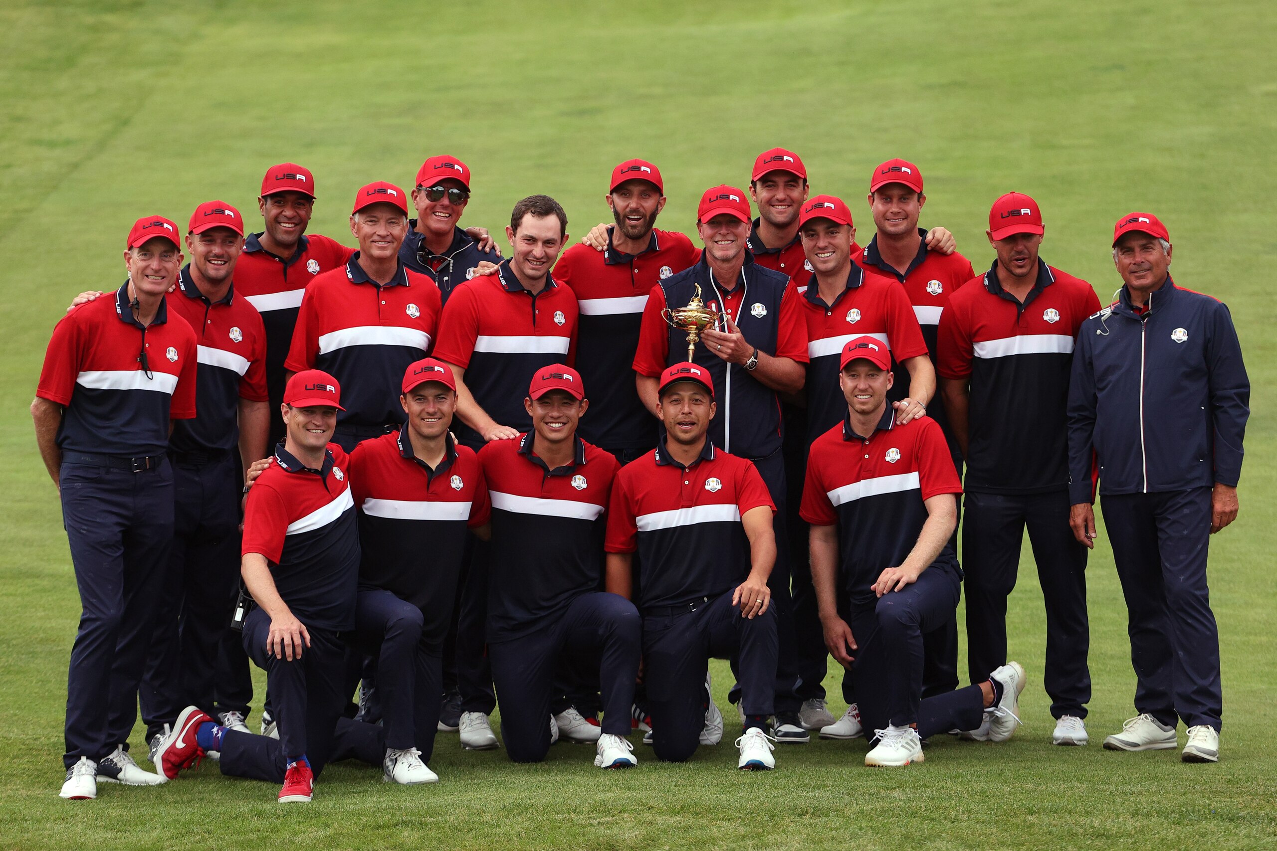 KOHLER, WISCONSIN - SEPTEMBER 26: Team United States celebrates with the Ryder Cup after defeating Team Europe 19 to 9 to win the 43rd Ryder Cup at Whistling Straits on September 26, 2021 in Kohler, Wisconsin. (Photo by Maddie Meyer/PGA of America/PGA of America via Getty Images )