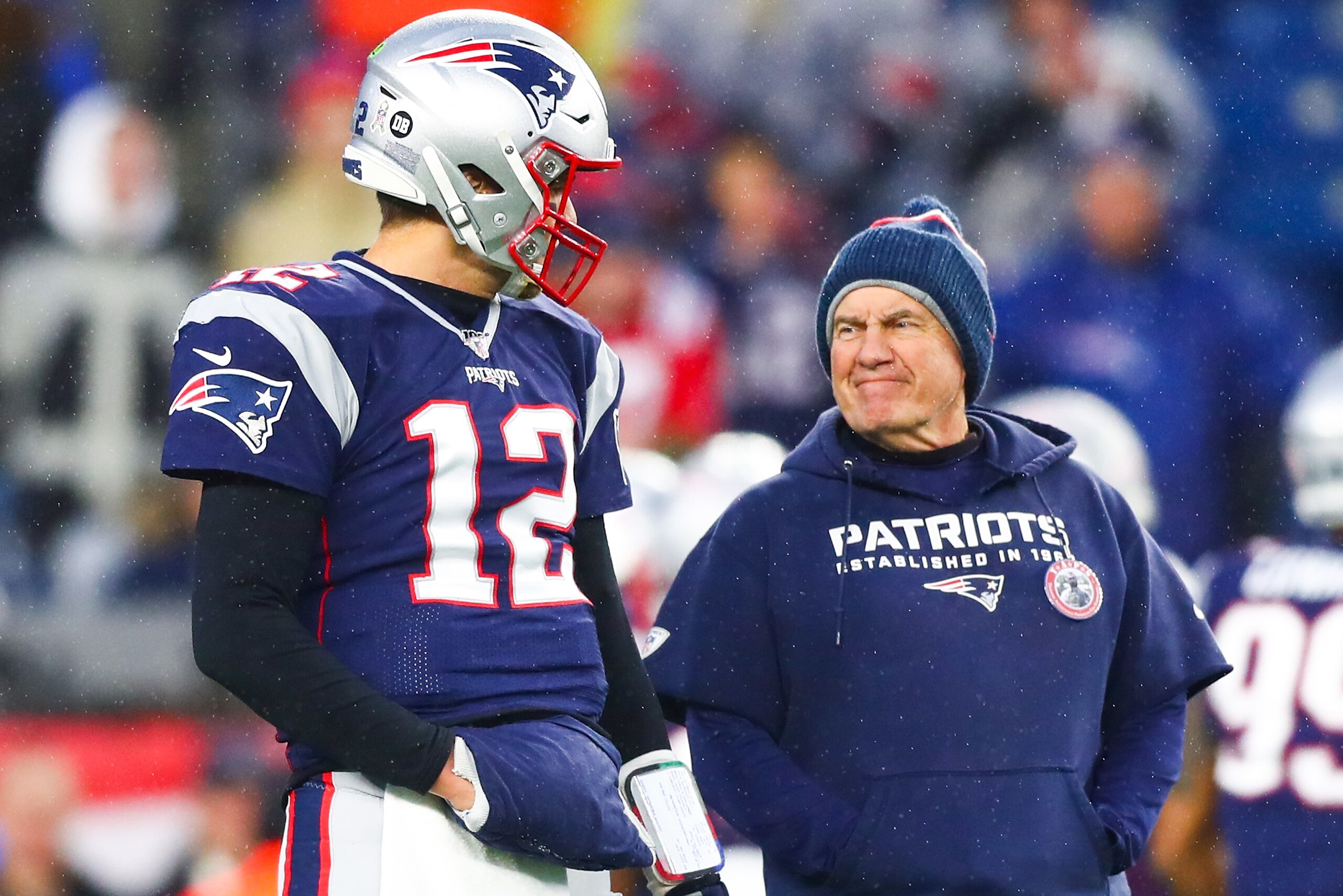 FOXBOROUGH, MA - NOVEMBER 24: Tom Brady #12 talks to head coach Bill Belichick of the New England Patriots before a game against the Dallas Cowboys at Gillette Stadium on November 24, 2019 in Foxborough, Massachusetts. (Photo by Adam Glanzman/Getty Images) FOXBOROUGH, MA - NOVEMBER 24: Tom Brady #12 talks to head coach Bill Belichick of the New England Patriots before a game against the Dallas Cowboys at Gillette Stadium on November 24, 2019 in Foxborough, Massachusetts. (Photo by Adam Glanzman/Getty Images)