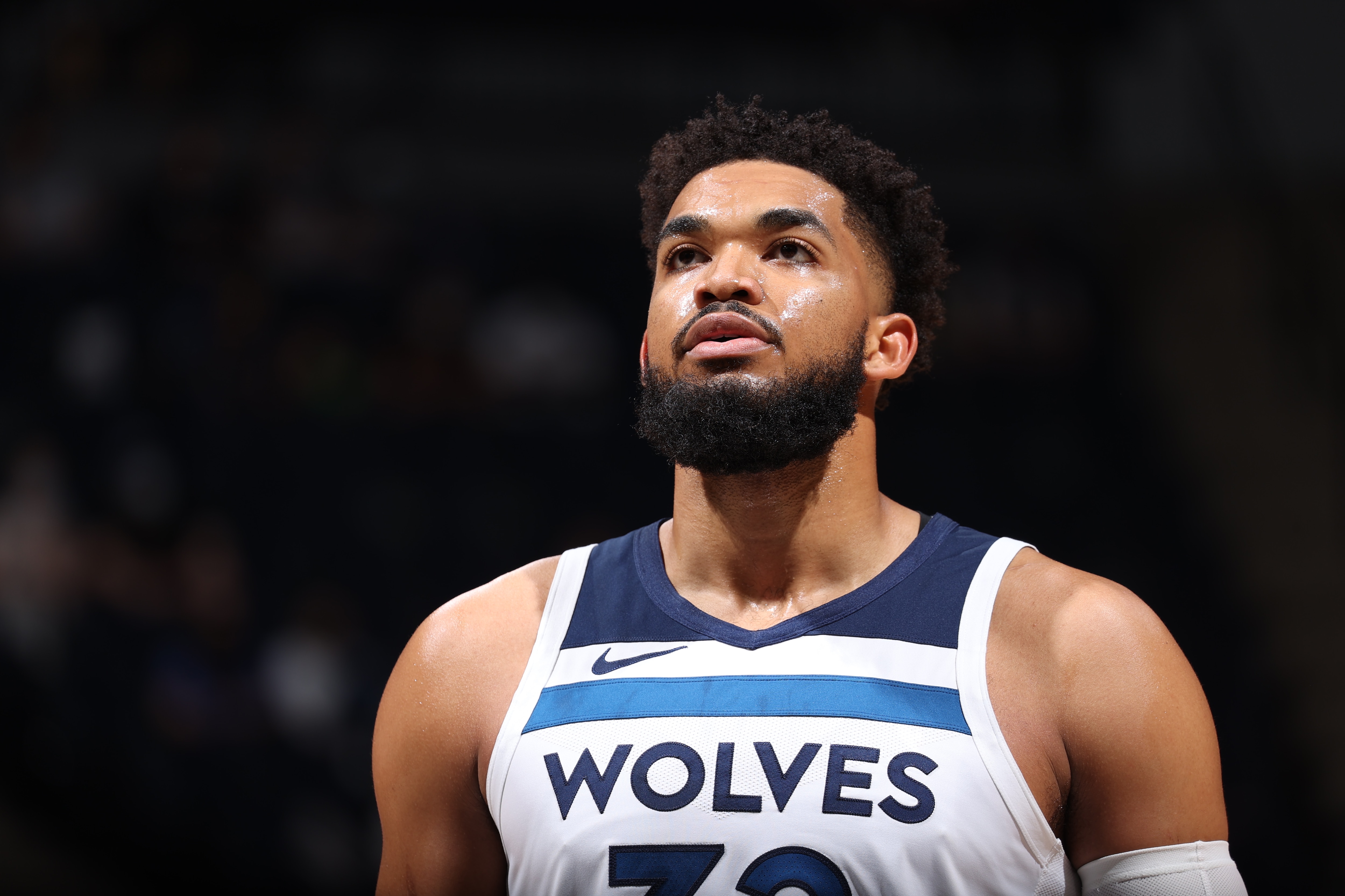 MINNEAPOLIS, MN -  MAY 16: Karl-Anthony Towns #32 of the Minnesota Timberwolves looks on during the game against the Dallas Mavericks on May 16, 2021 at Target Center in Minneapolis, Minnesota. NOTE TO USER: User expressly acknowledges and agrees that, by downloading and or using this Photograph, user is consenting to the terms and conditions of the Getty Images License Agreement. Mandatory Copyright Notice: Copyright 2021 NBAE (Photo by David Sherman/NBAE via Getty Images)