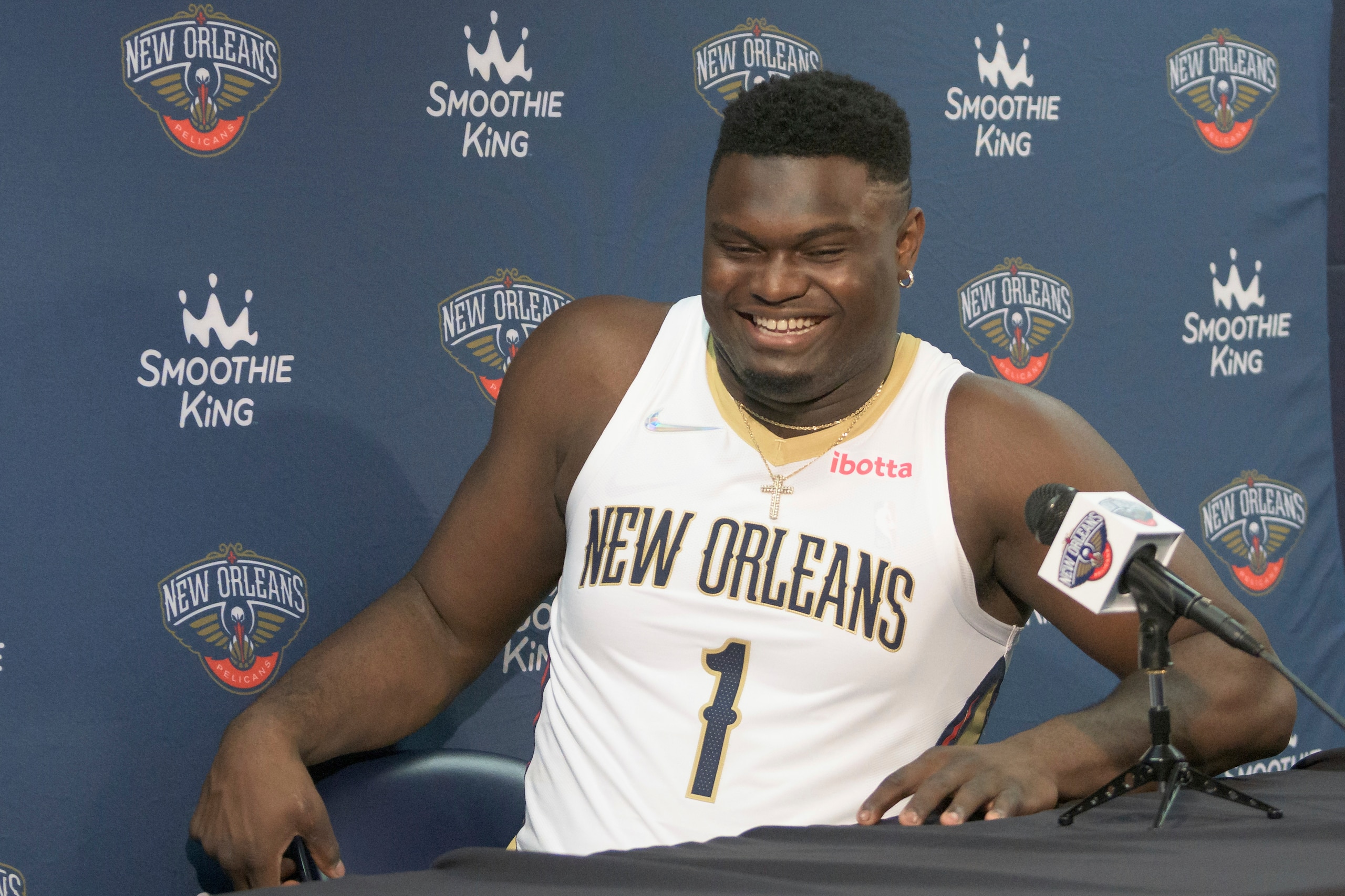 New Orleans Pelicans power forward Zion Williamson smiles during the NBA basketball team's Media Day in New Orleans, Monday, Sept. 27, 2021. (AP Photo/Matthew Hinton) New Orleans Pelicans power forward Zion Williamson smiles during the NBA basketball team's Media Day in New Orleans, Monday, Sept. 27, 2021. (AP Photo/Matthew Hinton)