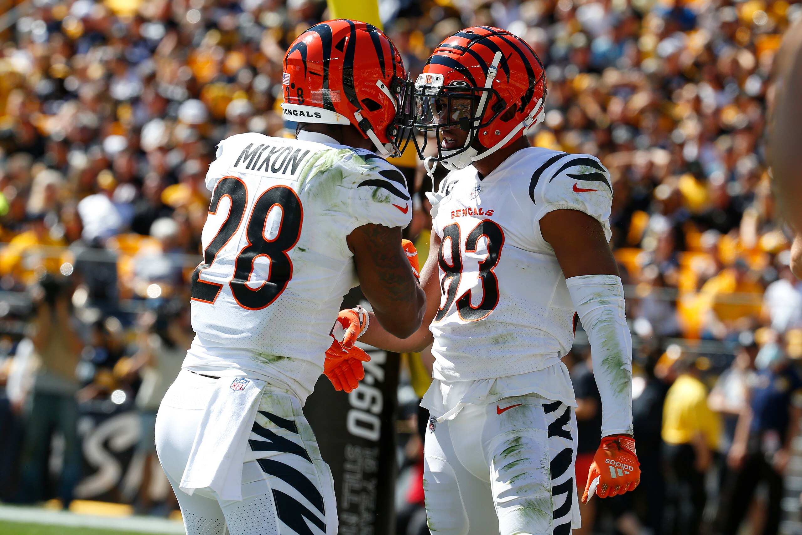 PITTSBURGH, PENNSYLVANIA - SEPTEMBER 26: Tyler Boyd #83 of the Cincinnati Bengals celebrates a touchdown with Joe Mixon #28 of the Cincinnati Bengals during the first quarter in the game against the Pittsburgh Steelers at Heinz Field on September 26, 2021 in Pittsburgh, Pennsylvania. (Photo by Justin K. Aller/Getty Images) PITTSBURGH, PENNSYLVANIA - SEPTEMBER 26: Tyler Boyd #83 of the Cincinnati Bengals celebrates a touchdown with Joe Mixon #28 of the Cincinnati Bengals during the first quarter in the game against the Pittsburgh Steelers at Heinz Field on September 26, 2021 in Pittsburgh, Pennsylvania. (Photo by Justin K. Aller/Getty Images)