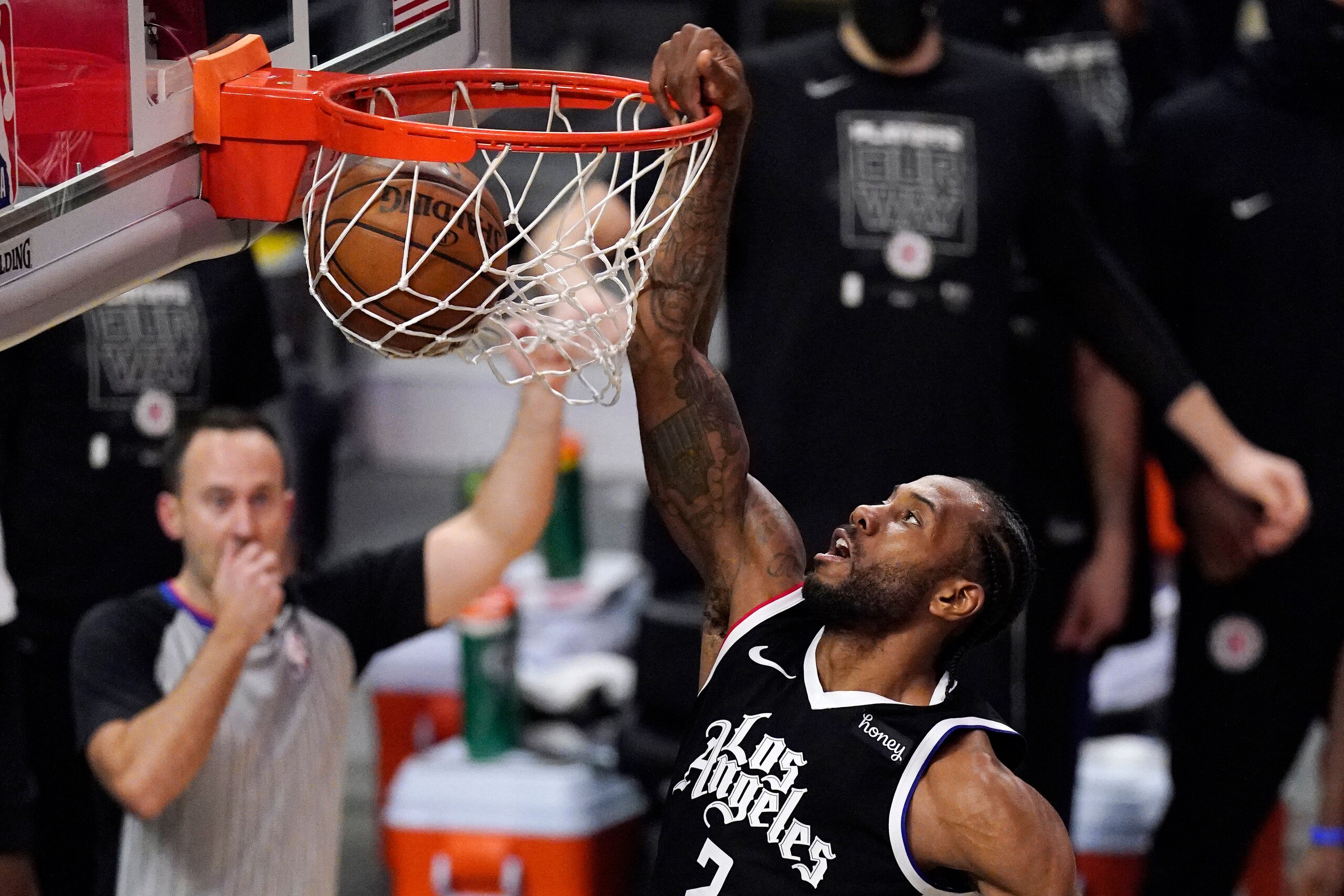 Los Angeles Clippers forward Kawhi Leonard dunks during the second half of Game 3 of a second-round NBA basketball playoff series against the Utah Jazz Saturday, June 12, 2021, in Los Angeles. (AP Photo/Mark J. Terrill) Los Angeles Clippers forward Kawhi Leonard dunks during the second half of Game 3 of a second-round NBA basketball playoff series against the Utah Jazz Saturday, June 12, 2021, in Los Angeles. (AP Photo/Mark J. Terrill)