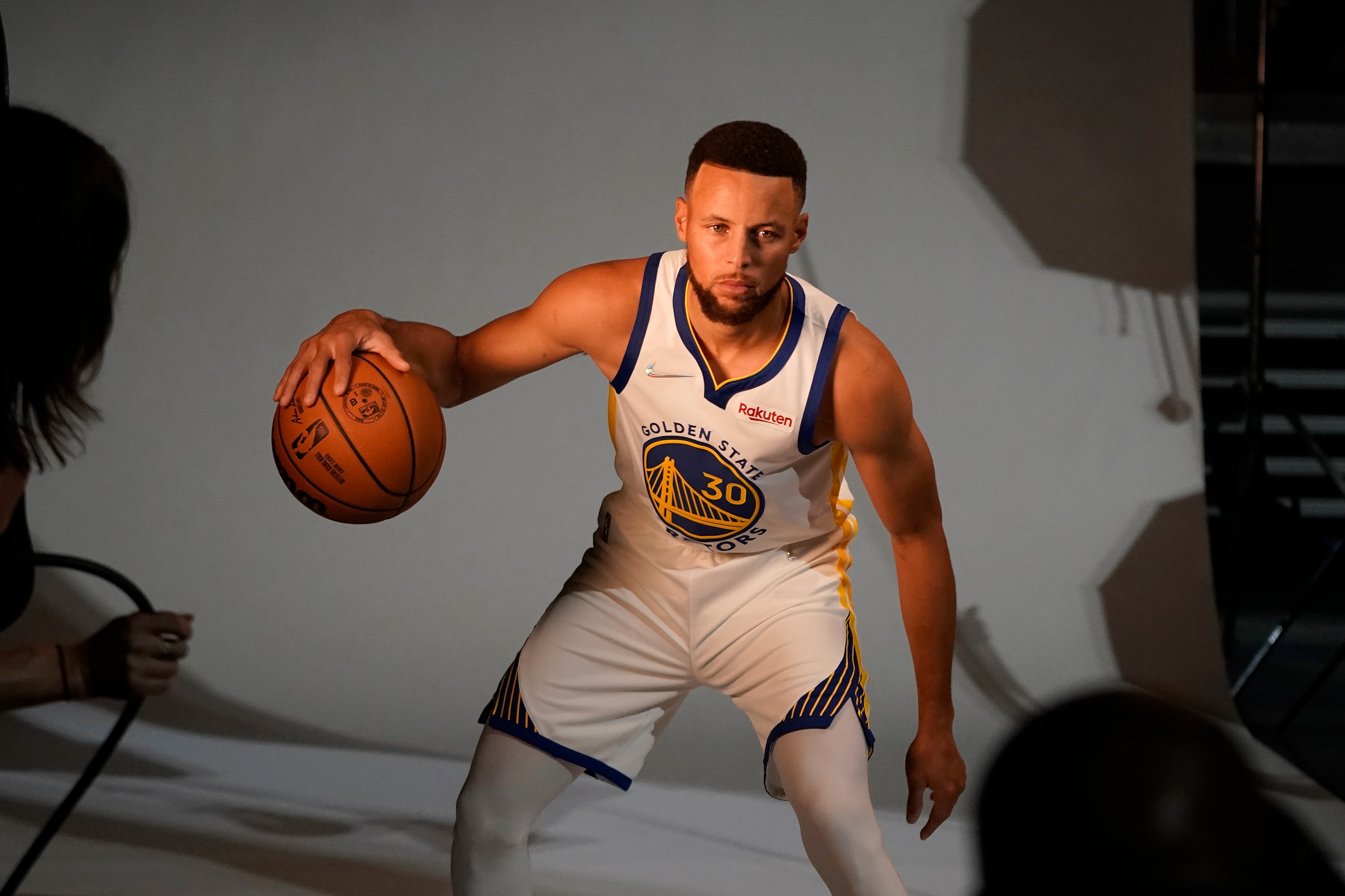 Golden State Warriors guard Stephen Curry poses for photos during the NBA basketball team's media day in San Francisco, Monday, Sept. 27, 2021. (AP Photo/Jeff Chiu)
