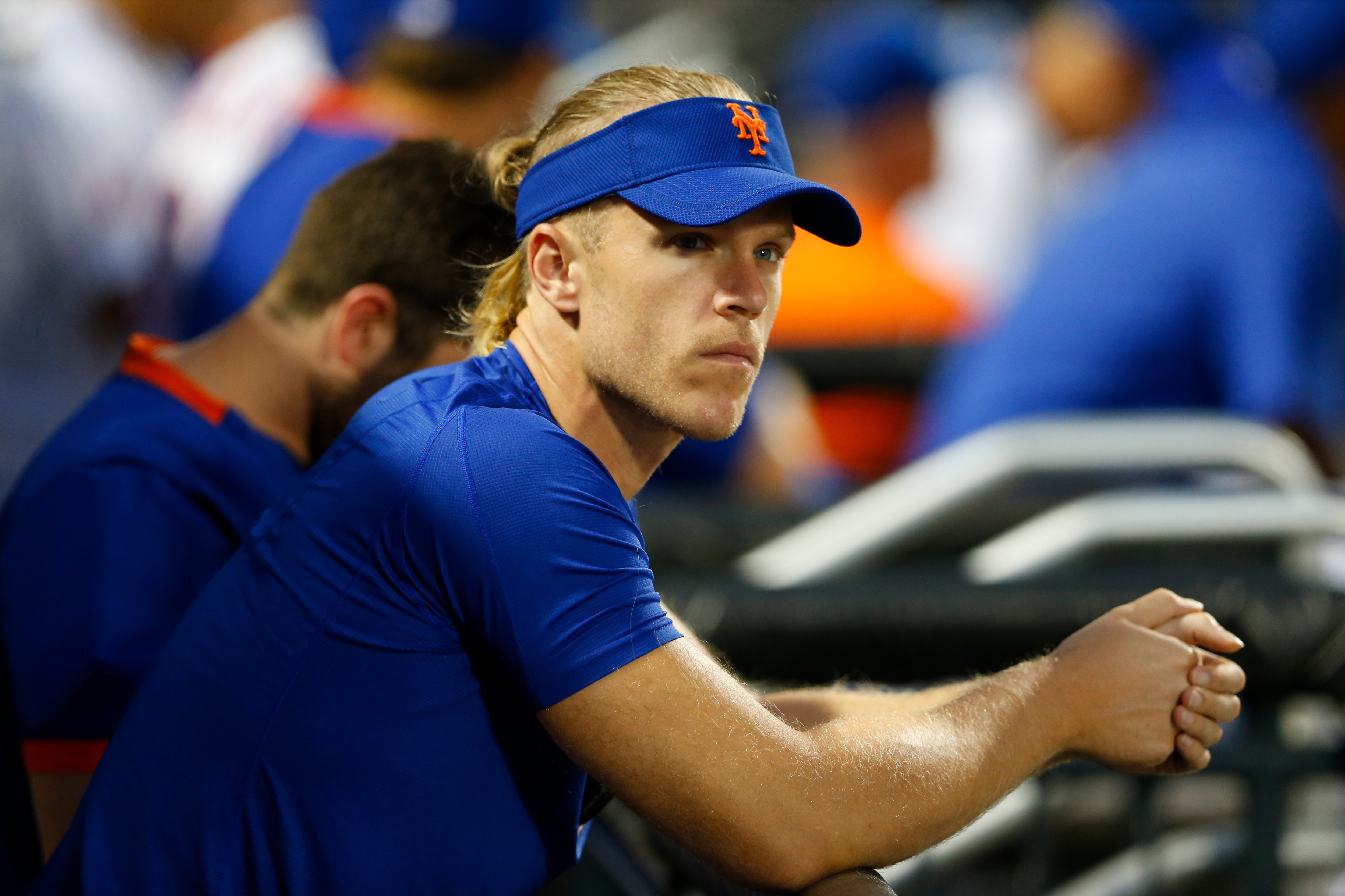 New York Mets pitcher Noah Syndergaard watches play against the Los Angeles Dodgers during the first inning of a baseball game Saturday, Aug. 14, 2021, in New York. (AP Photo/Noah K. Murray)