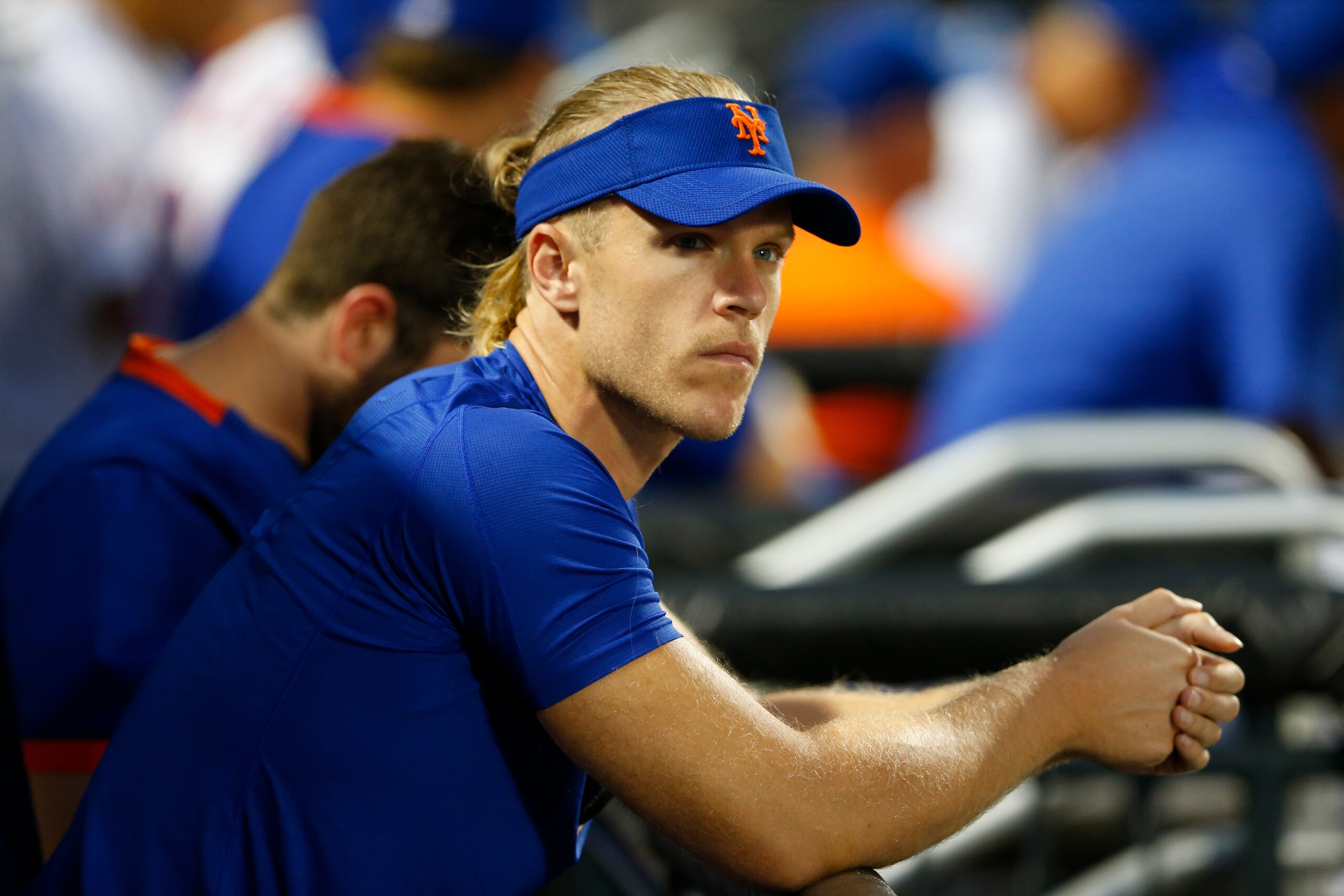 New York Mets pitcher Noah Syndergaard watches play against the Los Angeles Dodgers during the first inning of a baseball game Saturday, Aug. 14, 2021, in New York. (AP Photo/Noah K. Murray)