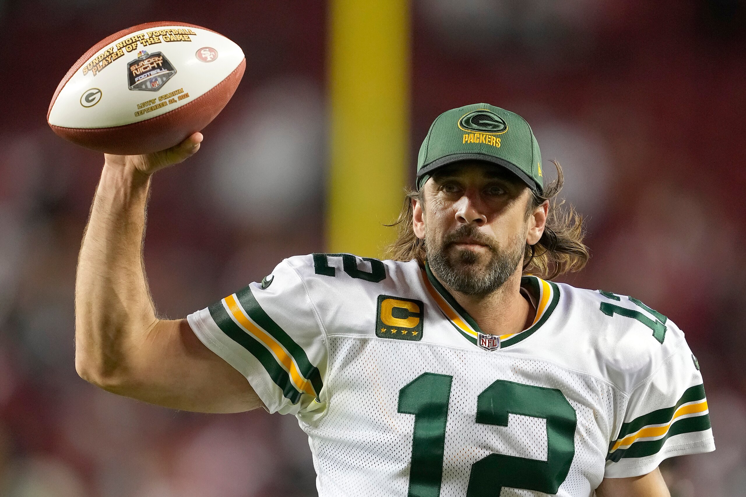 Green Bay Packers quarterback Aaron Rodgers (12) gestures as he jogs off the field after the Packers defeated the San Francisco 49ers in an NFL football game in Santa Clara, Calif., Sunday, Sept. 26, 2021. (AP Photo/Tony Avelar)