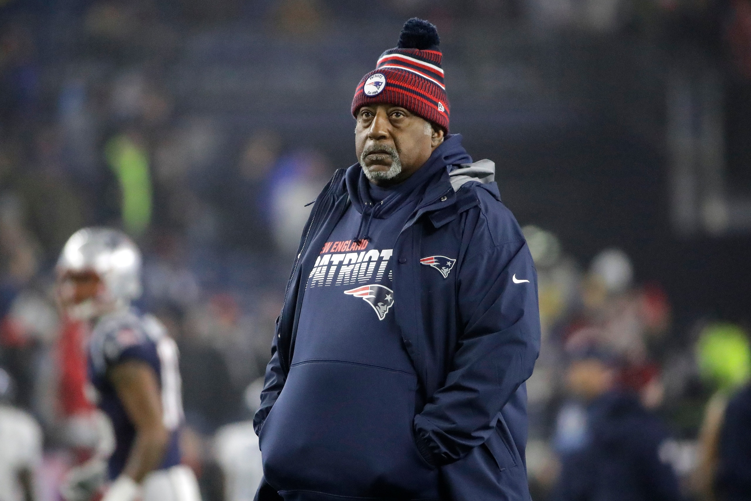 New England Patriots running backs coach Ivan Fears watches the team warm up before an NFL wild-card playoff football game against the Tennessee Titans, Saturday, Jan. 4, 2020, in Foxborough, Mass. (AP Photo/Elise Amendola) New England Patriots running backs coach Ivan Fears watches the team warm up before an NFL wild-card playoff football game against the Tennessee Titans, Saturday, Jan. 4, 2020, in Foxborough, Mass. (AP Photo/Elise Amendola)