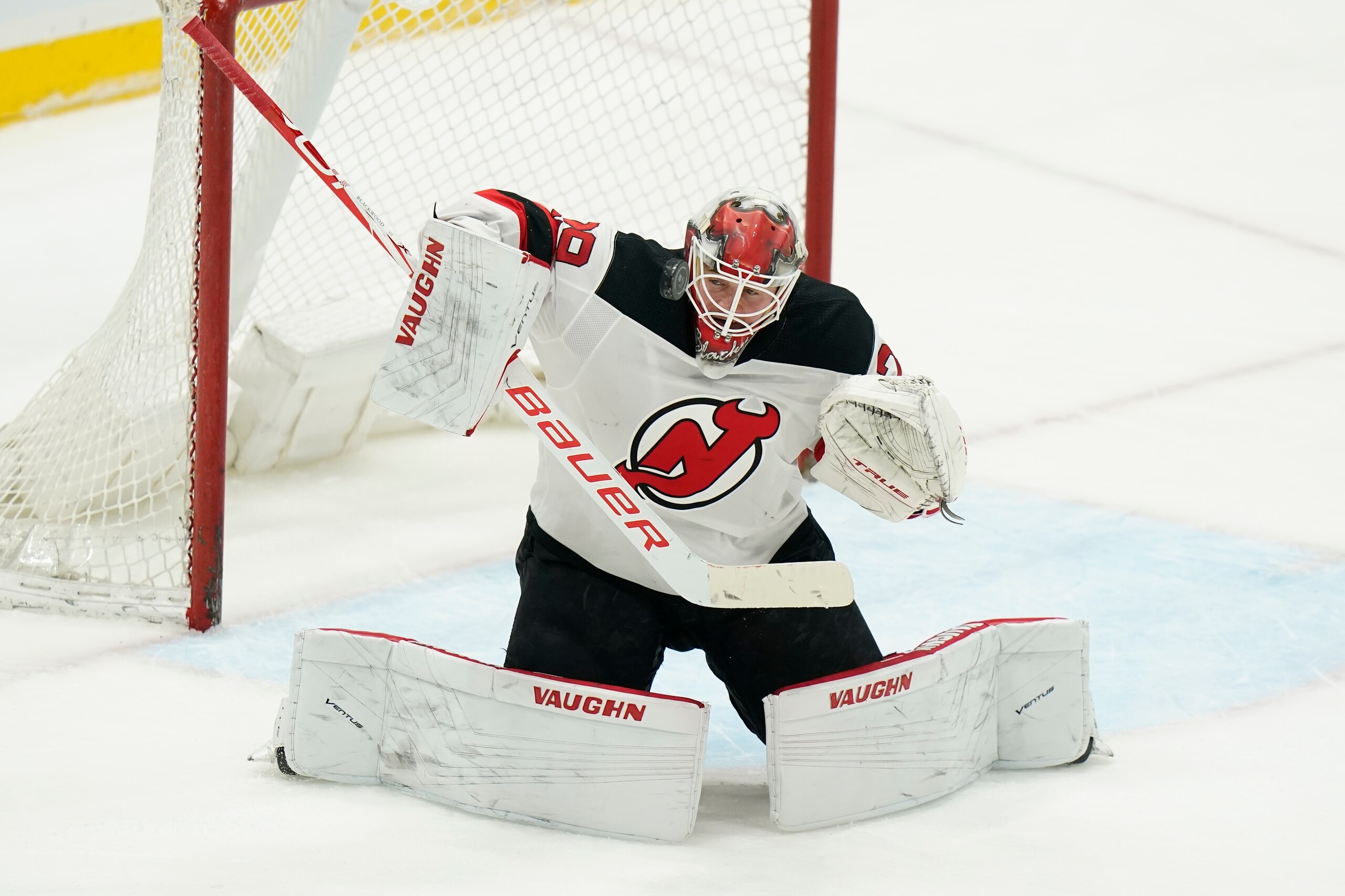 New Jersey Devils goaltender Mackenzie Blackwood (29) stops a shot on goal during the second period of an NHL hockey game against the New York Islanders Saturday, May 8, 2021, in Uniondale, N.Y. (AP Photo/Frank Franklin II)