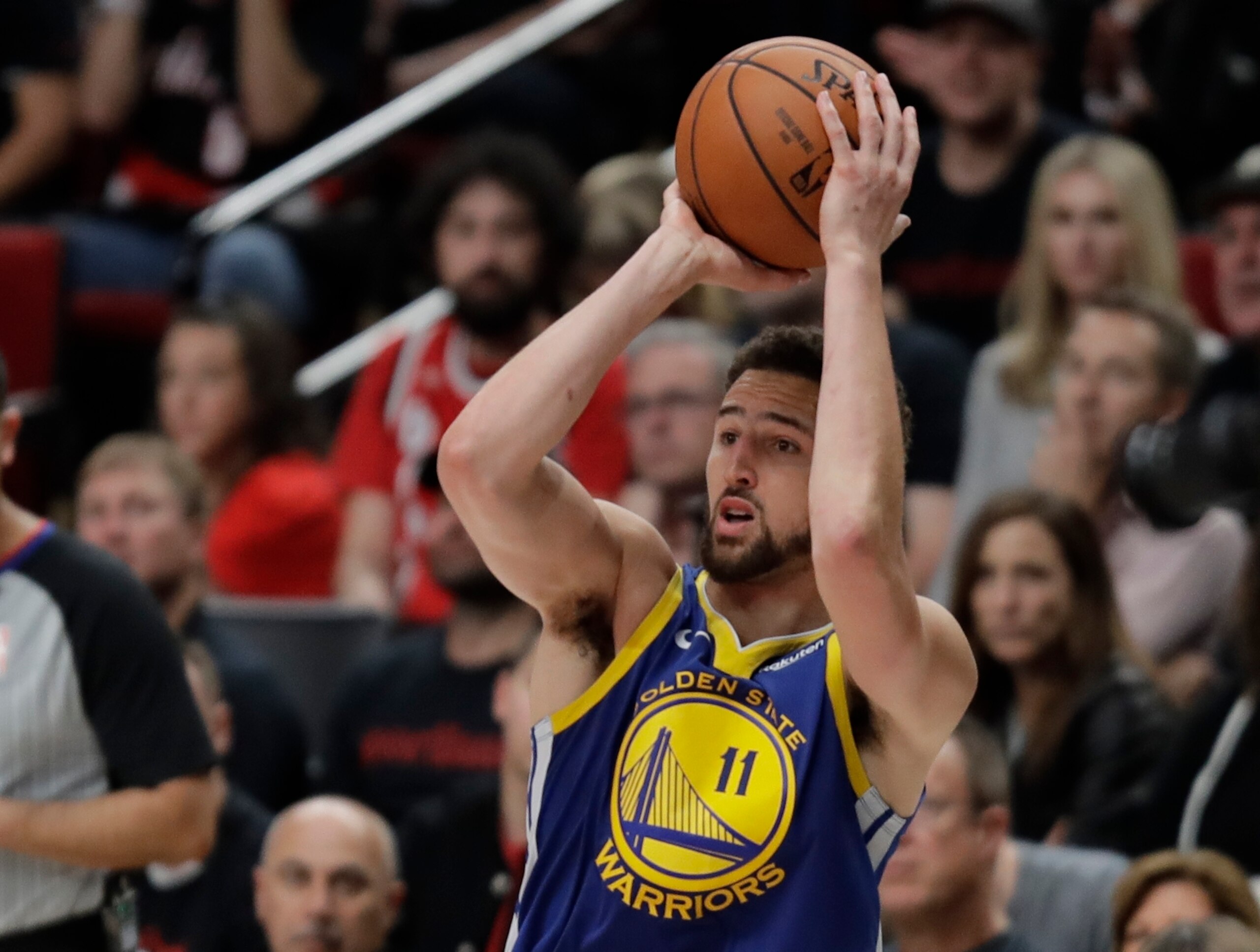 Golden State Warriors guard Klay Thompson shoots during the second half of Game 3 of the NBA basketball playoffs Western Conference finals against the Portland Trail Blazers, Saturday, May 18, 2019, in Portland, Ore. The Warriors won 110-99. (AP Photo/Ted S. Warren)