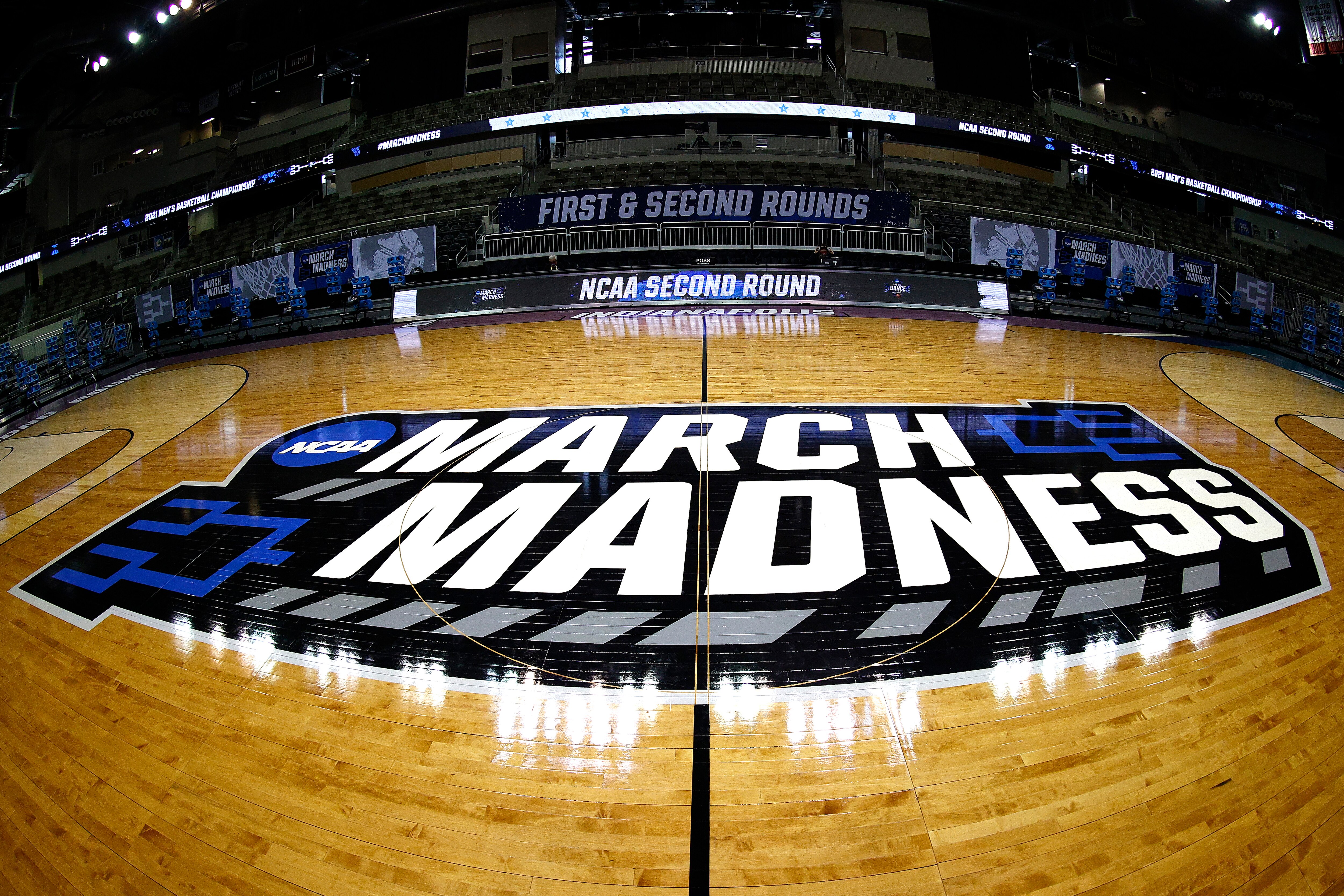 INDIANAPOLIS, INDIANA - MARCH 21: A general view of the March Madness logo on center court is seen before the game between the Oral Roberts Golden Eagles and the Florida Gators in the second round game of the 2021 NCAA Men's Basketball Tournament at Indiana Farmers Coliseum on March 21, 2021 in Indianapolis, Indiana. (Photo by Maddie Meyer/Getty Images)
