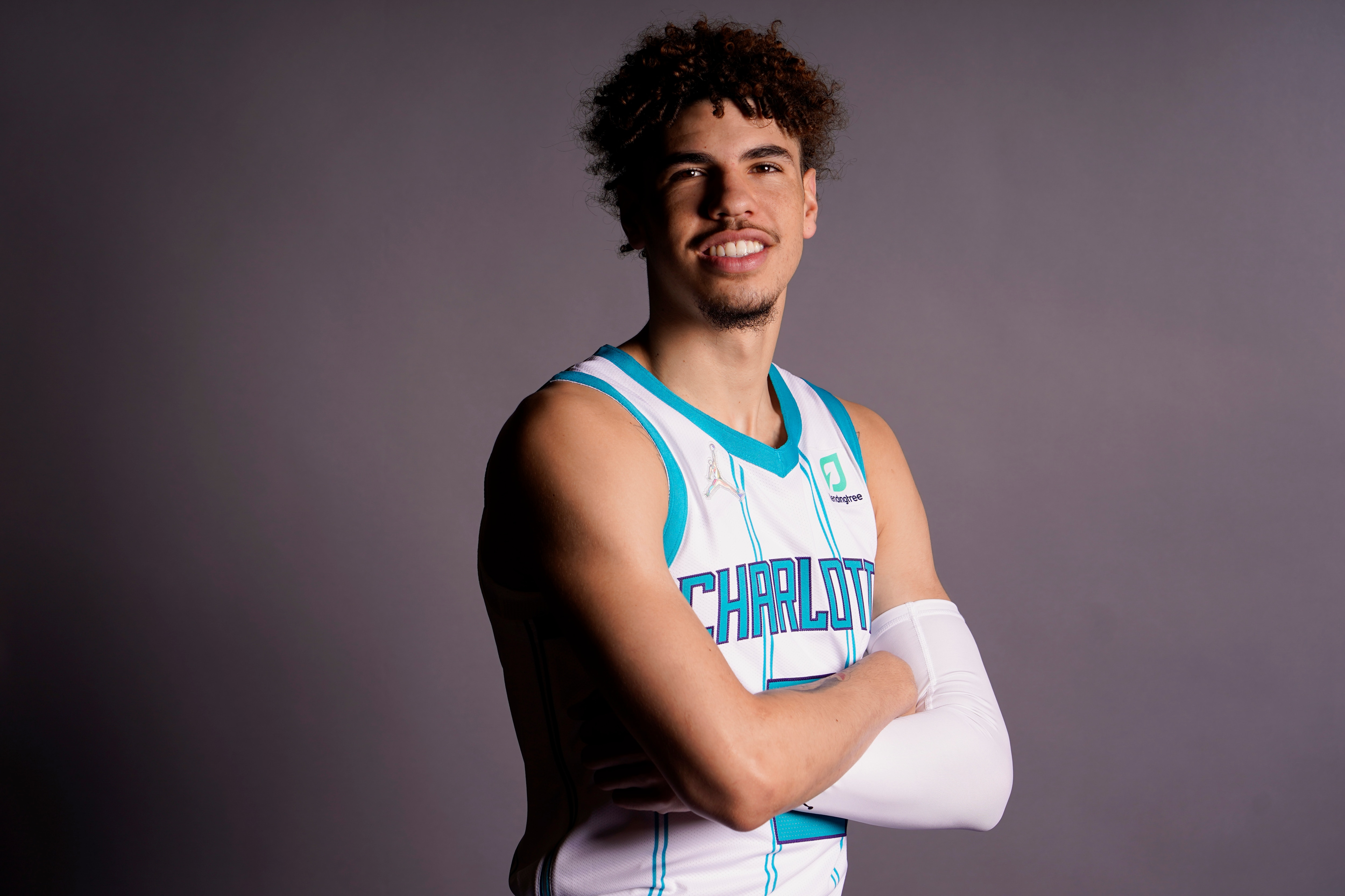 Charlotte Hornets' LaMelo Ball poses for a picture during media day Monday, Sept. 27, 2021, in Charlotte, N.C.(AP Photo/Chris Carlson)