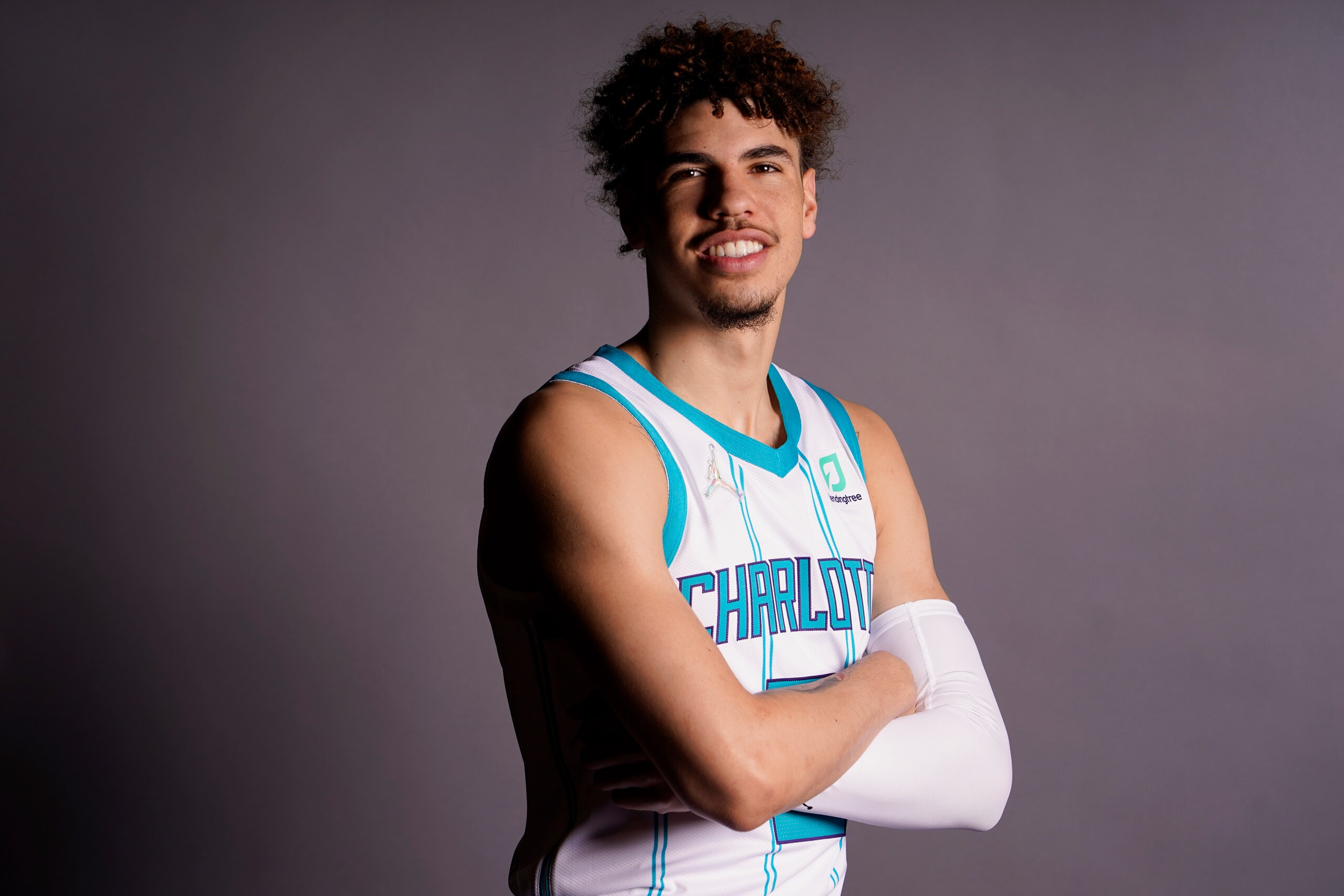 Charlotte Hornets' LaMelo Ball poses for a picture during media day Monday, Sept. 27, 2021, in Charlotte, N.C.(AP Photo/Chris Carlson) Charlotte Hornets' LaMelo Ball poses for a picture during media day Monday, Sept. 27, 2021, in Charlotte, N.C.(AP Photo/Chris Carlson)