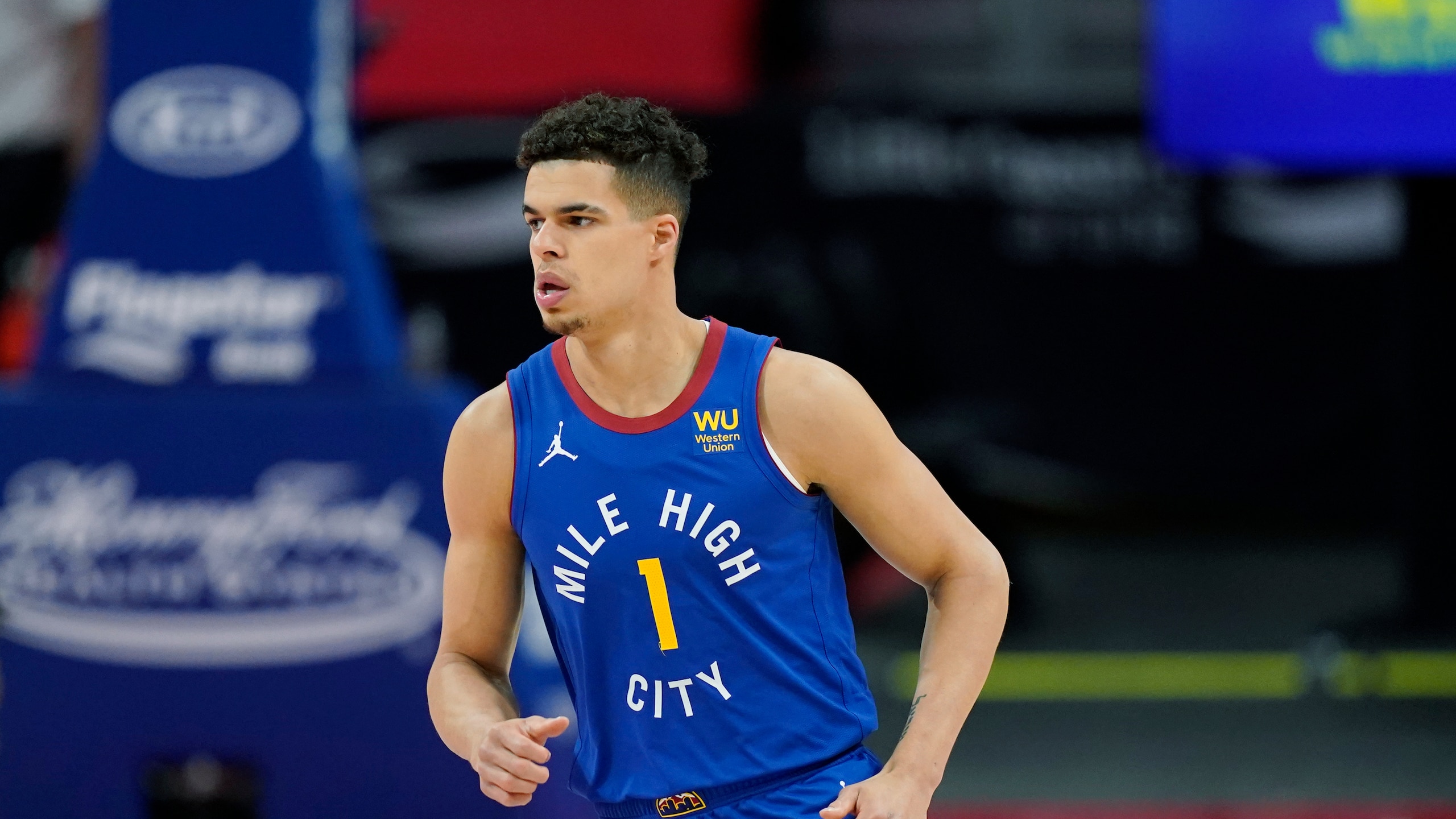 Denver Nuggets forward Michael Porter Jr. plays during the second half of an NBA basketball game, Friday, May 14, 2021, in Detroit. (AP Photo/Carlos Osorio)