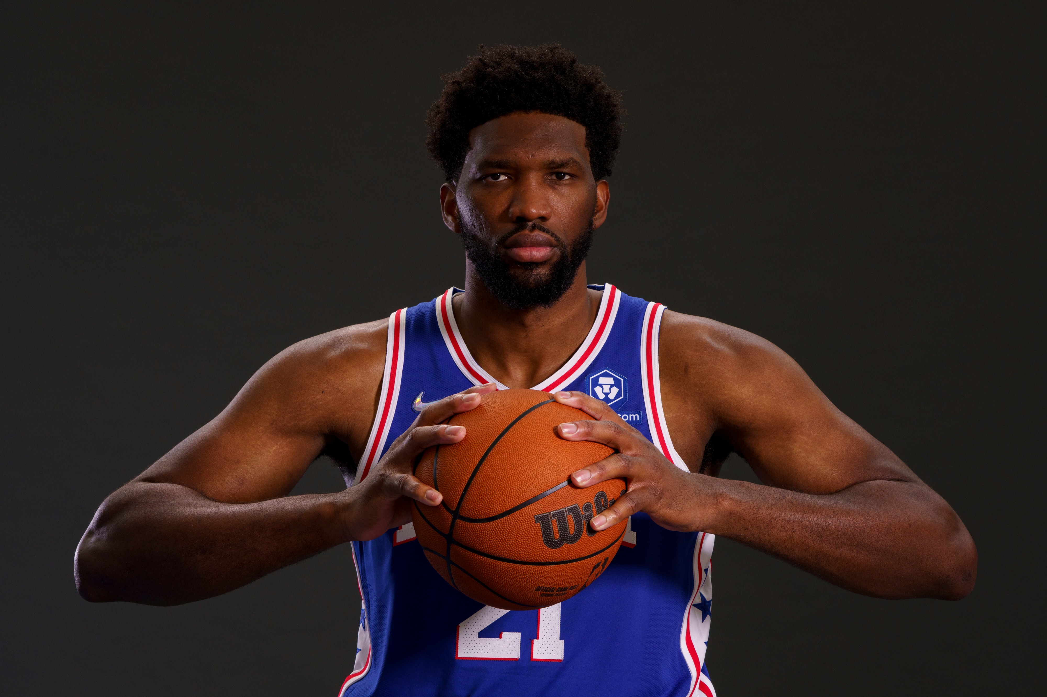 Philadelphia 76ers center Joel Embiid poses for photos during the NBA basketball team's Media Day in Camden, NJ, Monday, Sept. 27, 2021. (AP Photo/Chris Szagola)