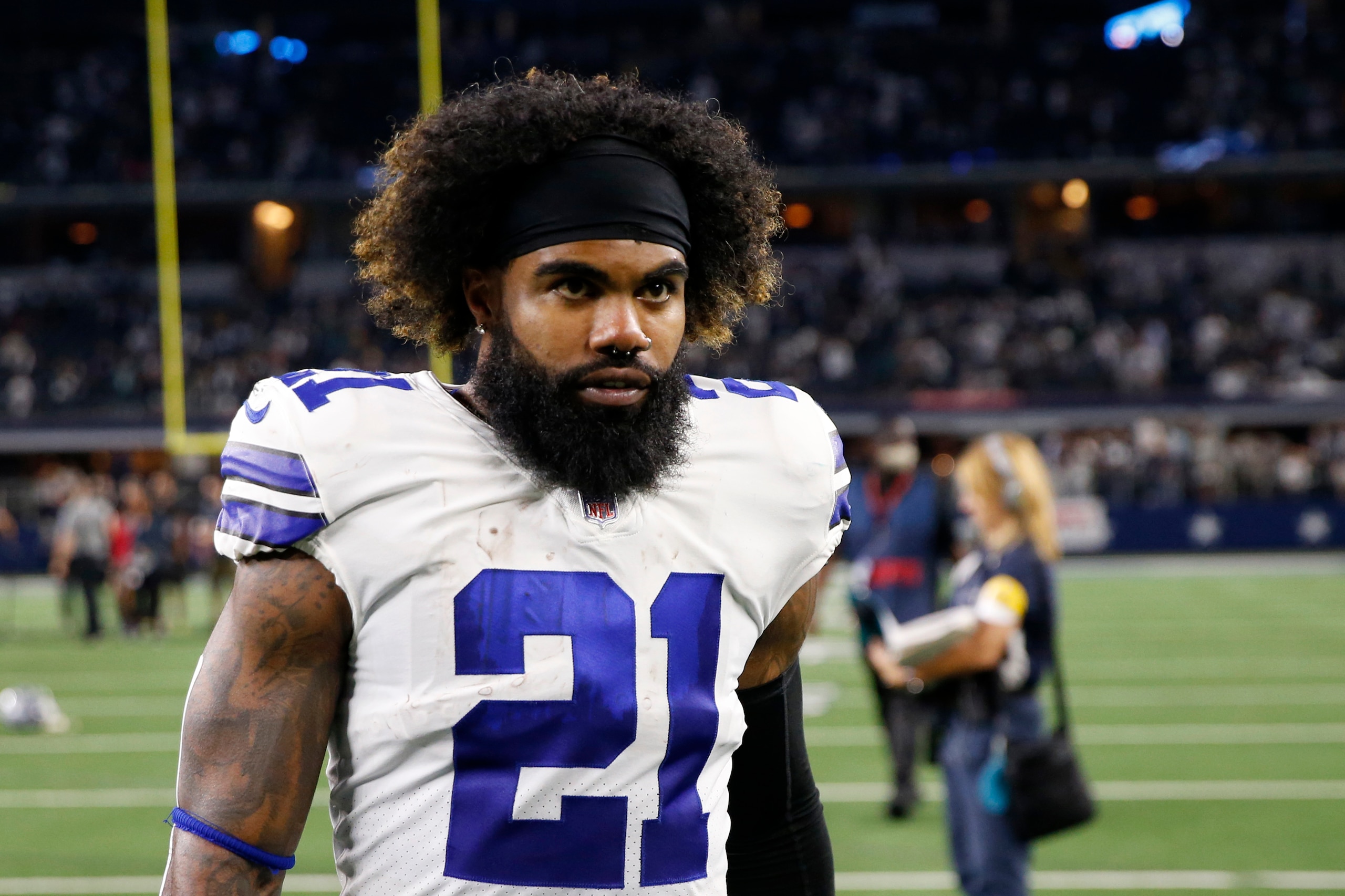 Dallas Cowboys running back Ezekiel Elliott leaves the field after an NFL football game against the Philadelphia Eagles in Arlington, Texas, Monday, Sept. 27, 2021. (AP Photo/Roger Steinman) Dallas Cowboys running back Ezekiel Elliott leaves the field after an NFL football game against the Philadelphia Eagles in Arlington, Texas, Monday, Sept. 27, 2021. (AP Photo/Roger Steinman)