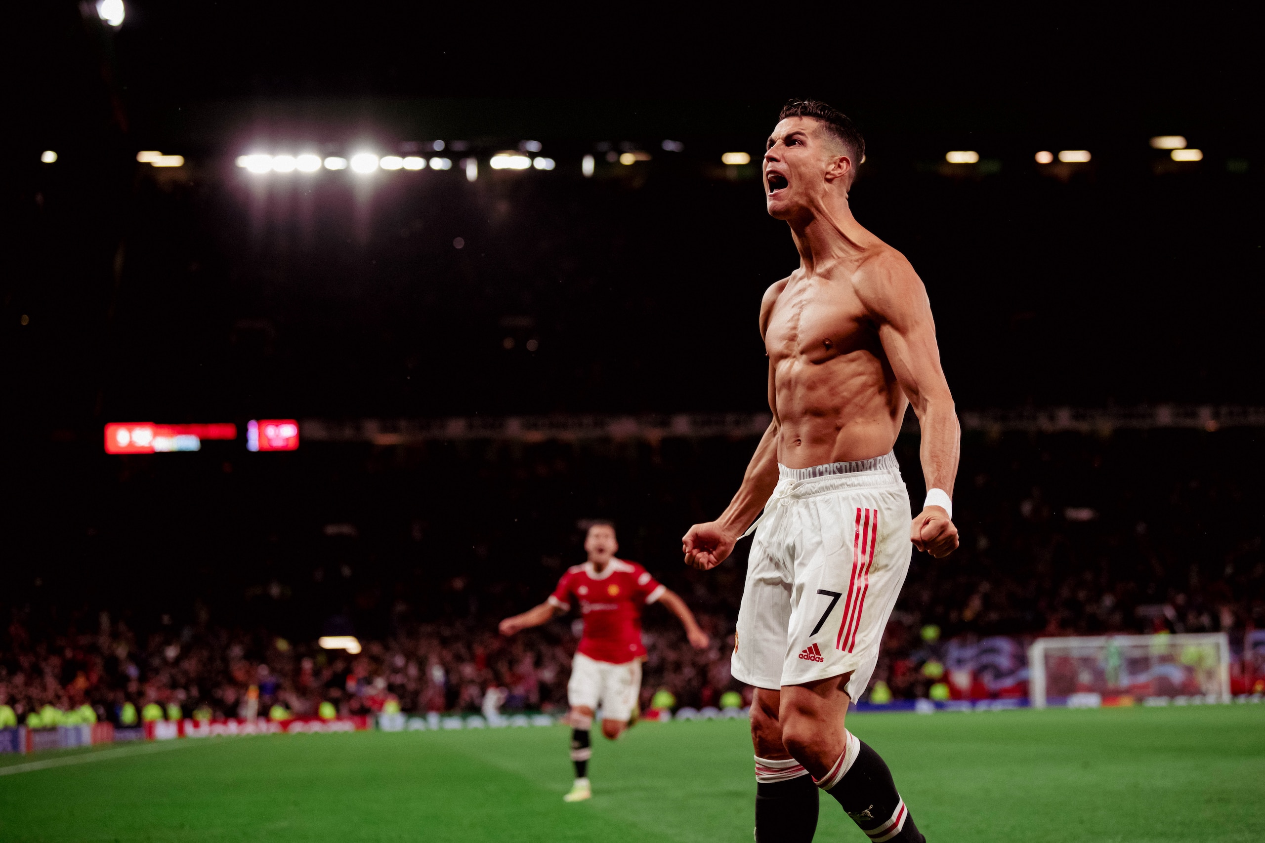 MANCHESTER, ENGLAND - SEPTEMBER 29:   Cristiano Ronaldo of Manchester United  celebrates scoring a goal to make the  2-1 during the UEFA Champions League group F match between Manchester United and Villarreal CF at Old Trafford on September 29, 2021 in Manchester, United Kingdom. (Photo by Ash Donelon/Manchester United via Getty Images)