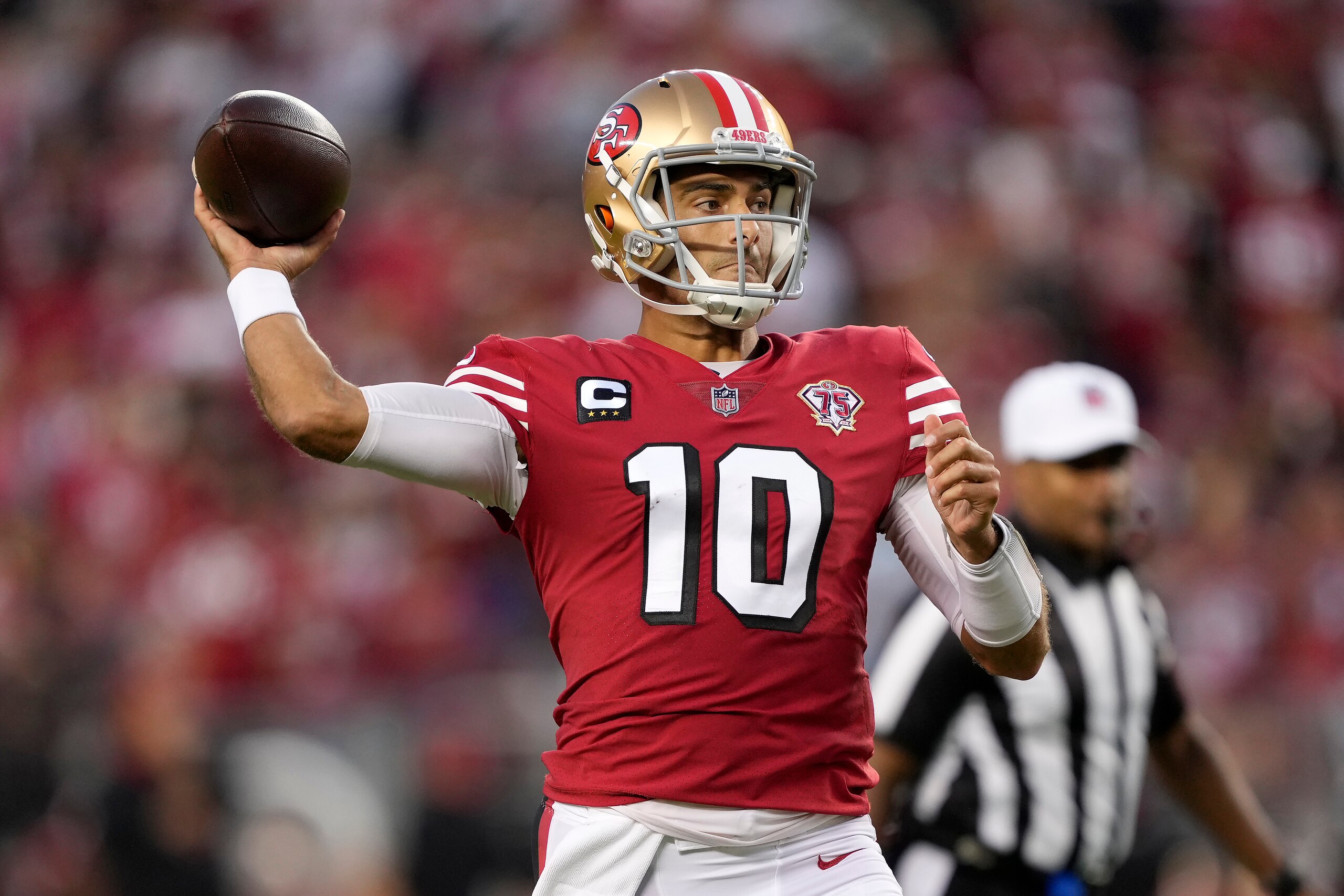 San Francisco 49ers quarterback Jimmy Garoppolo (10) passes against the Green Bay Packers during the first half of an NFL football game in Santa Clara, Calif., Sunday, Sept. 26, 2021. (AP Photo/Tony Avelar)