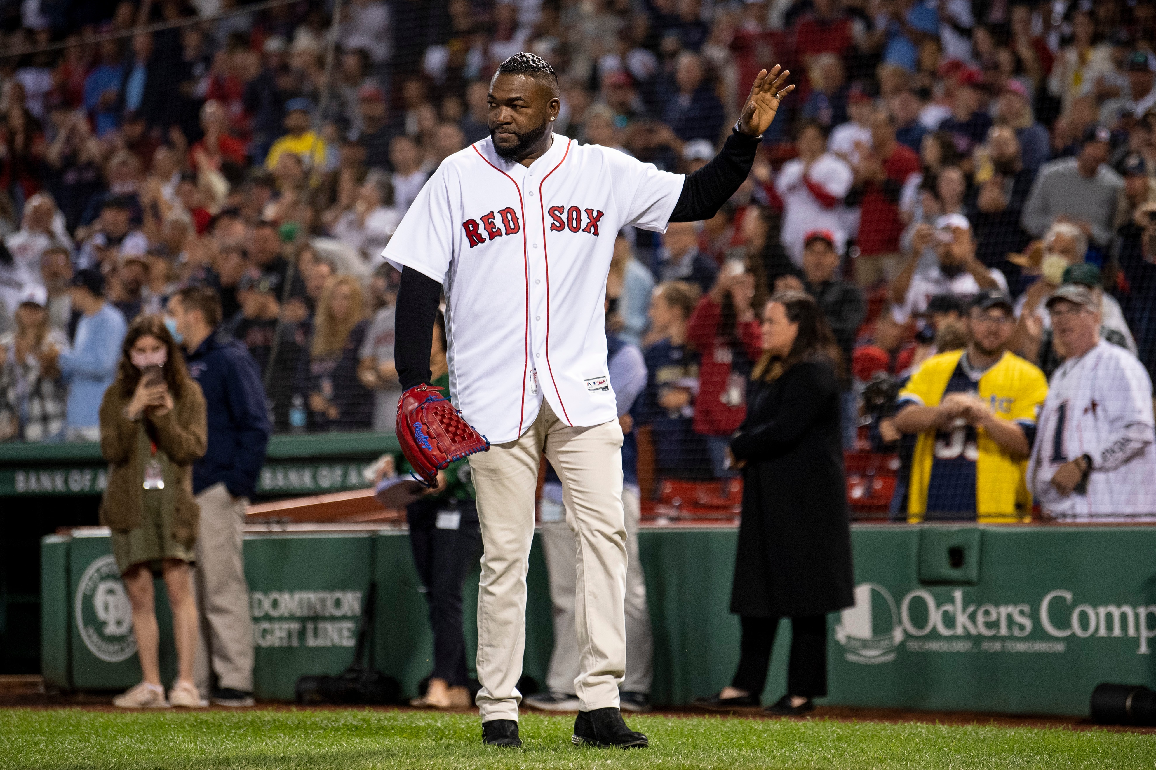 BOSTON, MA - SEPTEMBER 26: Former Boston Red Sox designated hitter David Ortiz is introduced before catching a ceremonial first pitch from the family of fallen Sergeant Johanny Rosario Pichardo before a game between the Boston Red Sox and the New York Yankees on September 26, 2021 at Fenway Park in Boston, Massachusetts. (Photo by Billie Weiss/Boston Red Sox/Getty Images)
