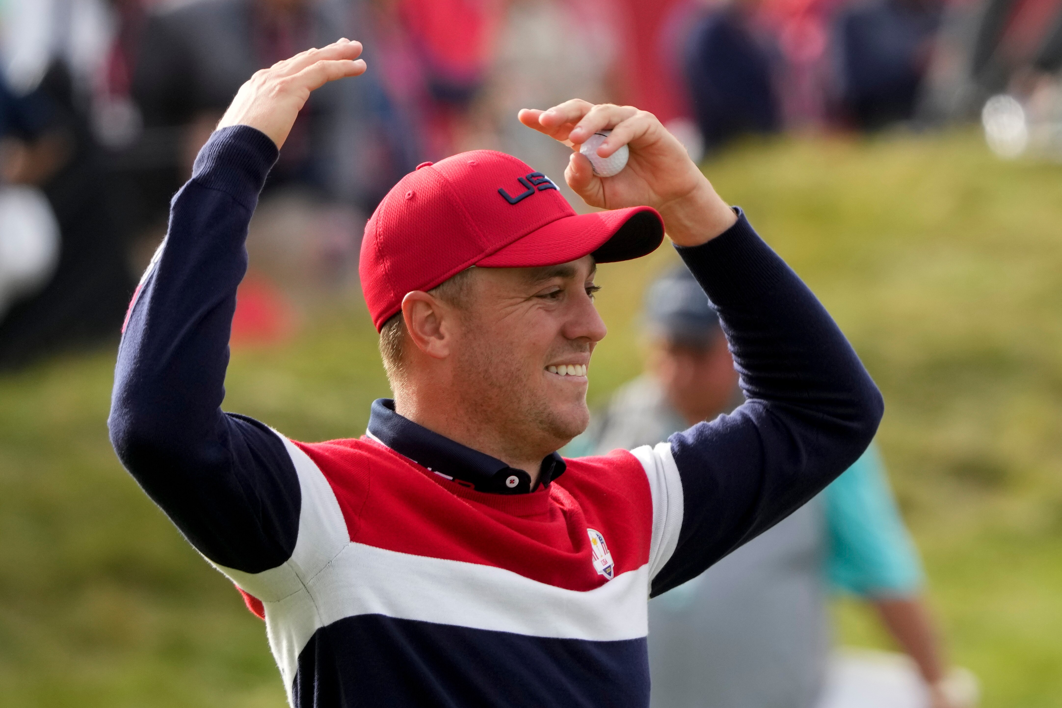 Team USA's Justin Thomas reacts after winning a Ryder Cup singles match at the Whistling Straits Golf Course Sunday, Sept. 26, 2021, in Sheboygan, Wis. (AP Photo/Charlie Neibergall)