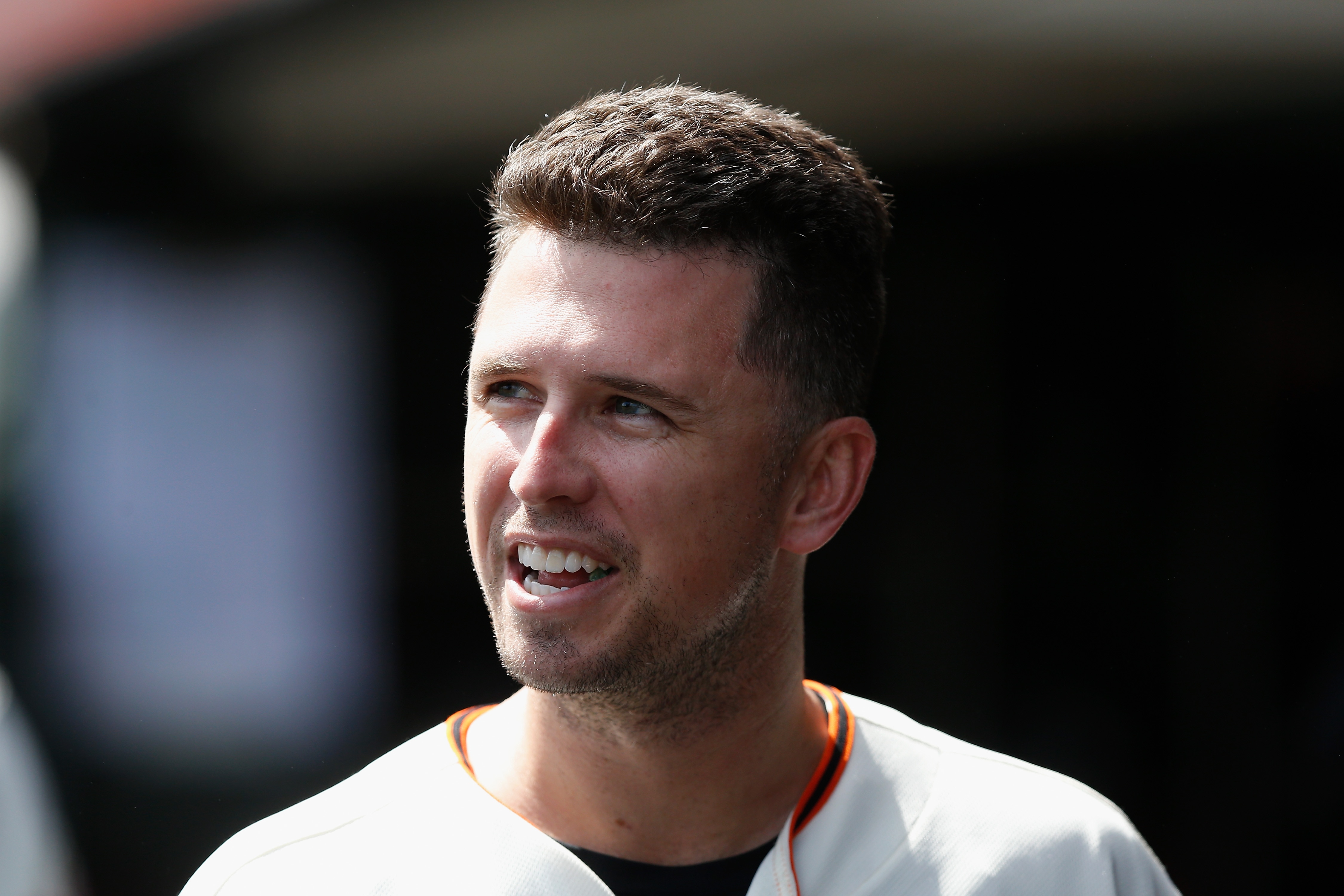 SAN FRANCISCO, CALIFORNIA - SEPTEMBER 19: Buster Posey #28 of the San Francisco Giants looks on in the dugout before the game against the Atlanta Braves at Oracle Park on September 19, 2021 in San Francisco, California. (Photo by Lachlan Cunningham/Getty Images)