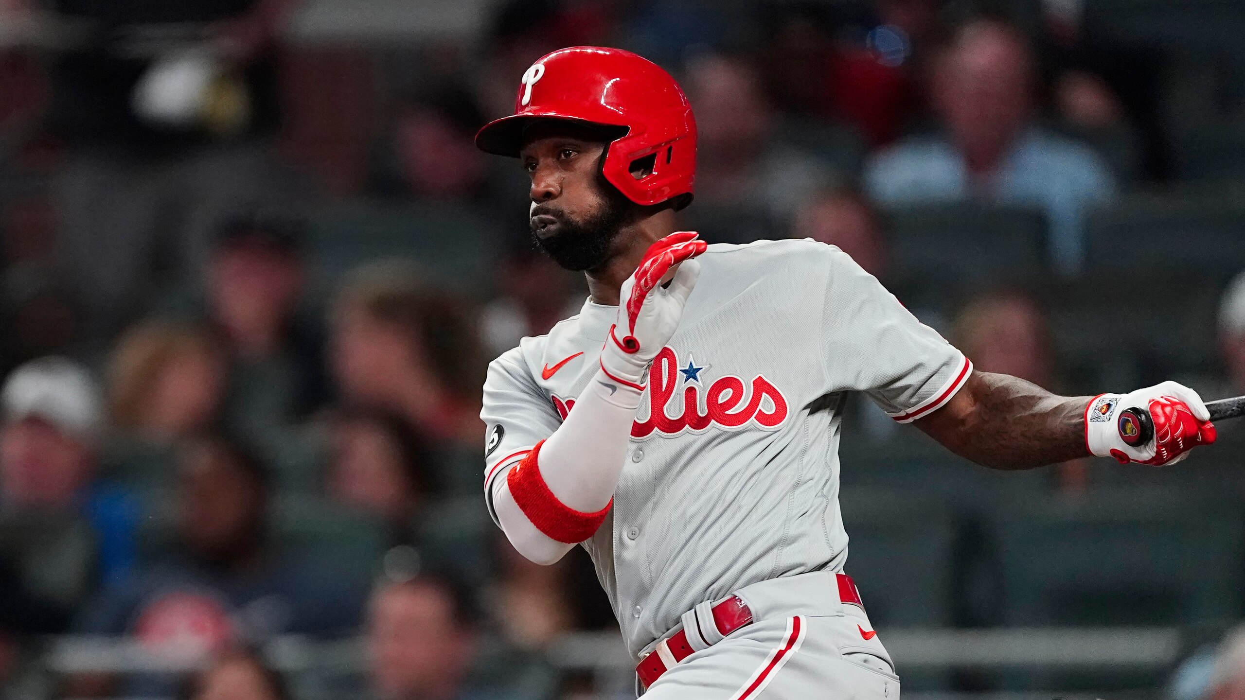 Philadelphia Phillies center fielder Andrew McCutchen (22) bats during a baseball game against the Atlanta Braves Wednesday, Sept. 29, 2021, in Atlanta. (AP Photo/John Bazemore)