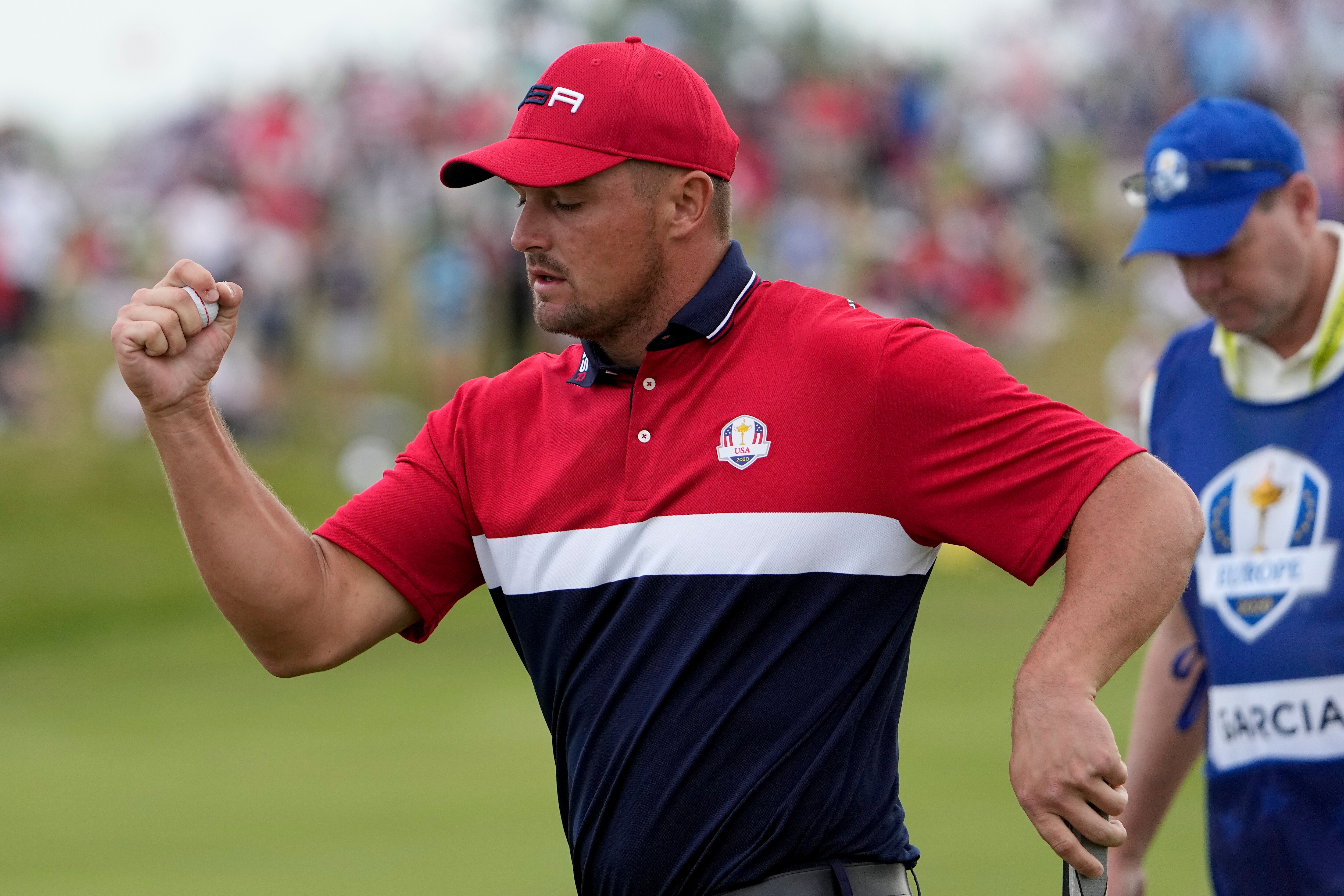 Team USA's Bryson DeChambeau reacts to his putt on the 11th hole during a Ryder Cup singles match at the Whistling Straits Golf Course Sunday, Sept. 26, 2021, in Sheboygan, Wis. (AP Photo/Jeff Roberson)