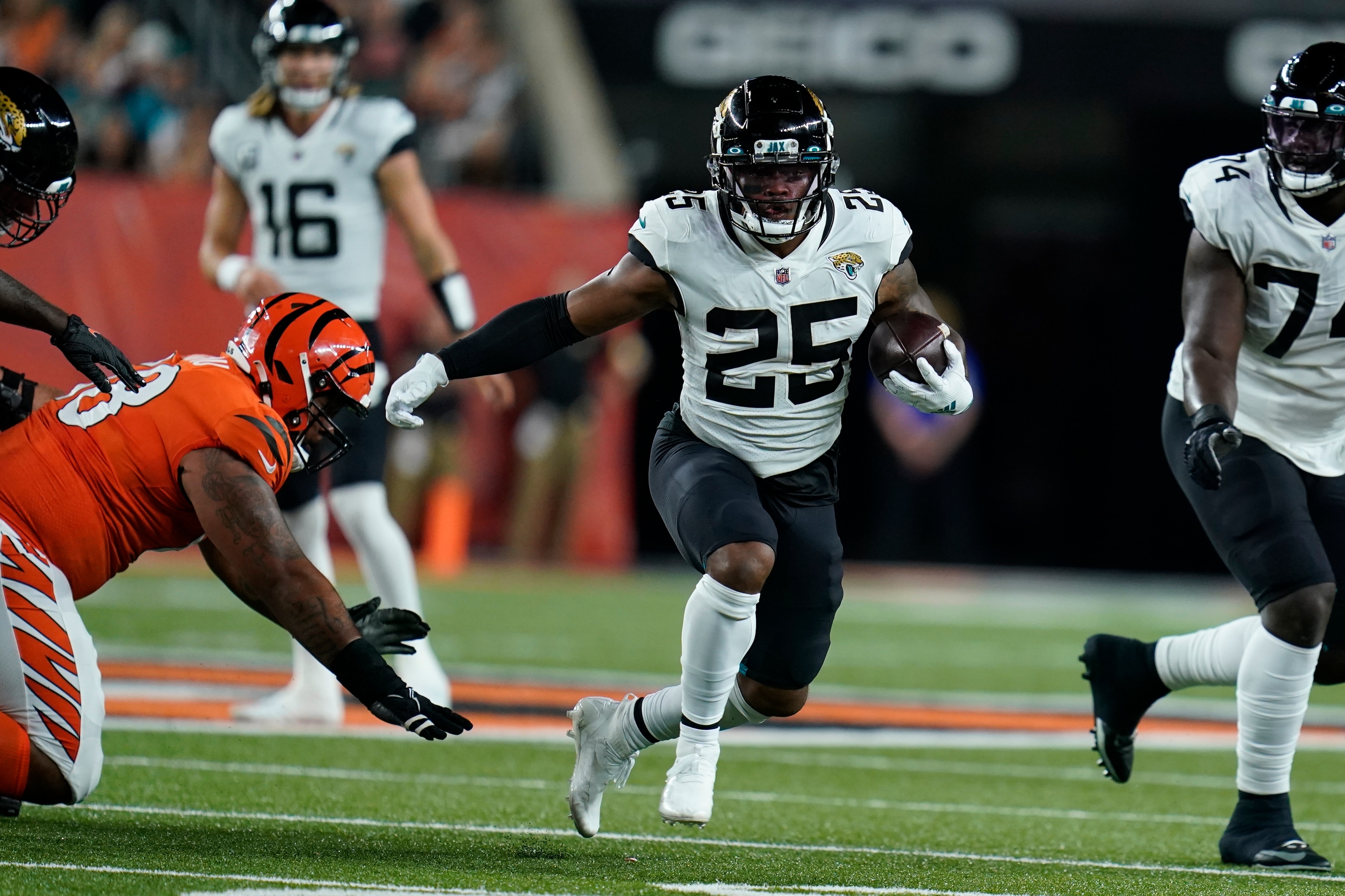 Jacksonville Jaguars' James Robinson (25) runs during the first half of an NFL football game against the Cincinnati Bengals, Thursday, Sept. 30, 2021, in Cincinnati. (AP Photo/Michael Conroy) Jacksonville Jaguars' James Robinson (25) runs during the first half of an NFL football game against the Cincinnati Bengals, Thursday, Sept. 30, 2021, in Cincinnati. (AP Photo/Michael Conroy)