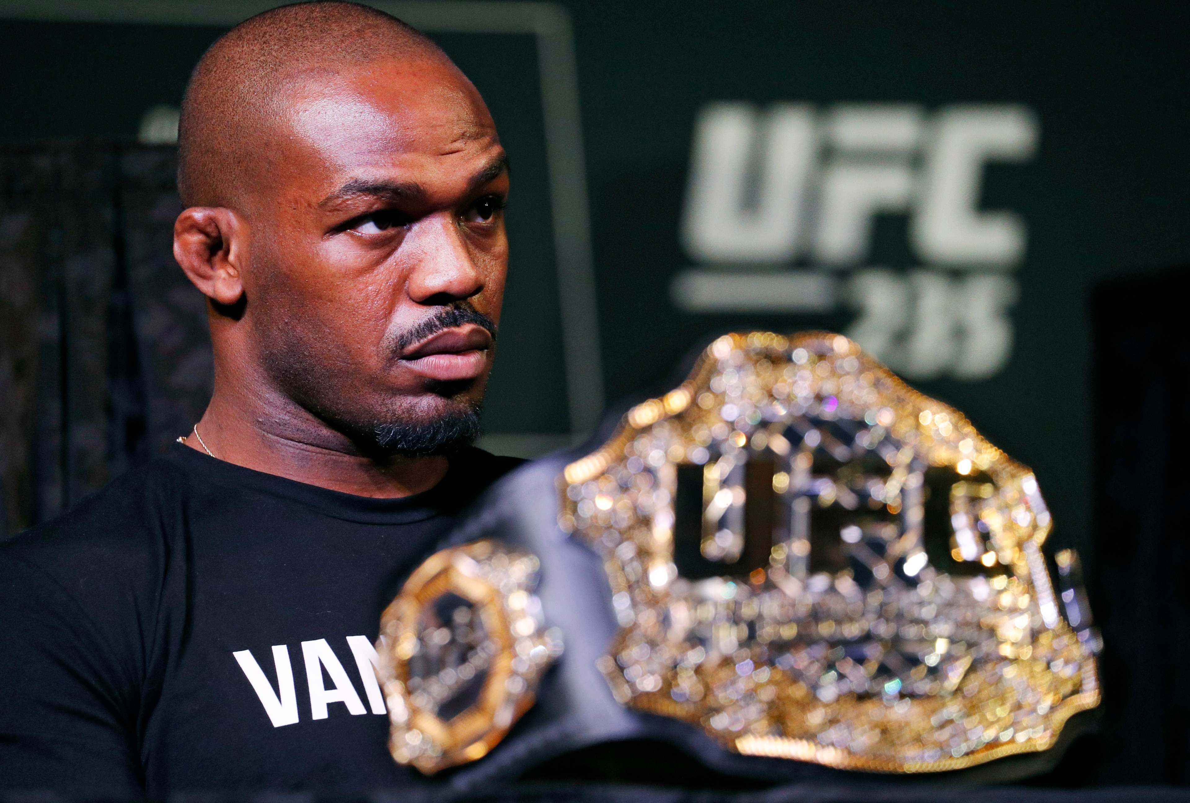 FILE - In this Jan. 31, 2019, file photo, light heavyweight champion Jon Jones attends a news conference for the UFC 235 mixed martial arts event in Las Vegas. Former mixed martial arts champion Jones was jailed in Las Vegas early Friday, Sept. 24, 2021, after a predawn incident at Caesars Palace that police said led to his arrest on charges of domestic battery and felony damaging a vehicle. (AP Photo/John Locher, File) FILE - In this Jan. 31, 2019, file photo, light heavyweight champion Jon Jones attends a news conference for the UFC 235 mixed martial arts event in Las Vegas. Former mixed martial arts champion Jones was jailed in Las Vegas early Friday, Sept. 24, 2021, after a predawn incident at Caesars Palace that police said led to his arrest on charges of domestic battery and felony damaging a vehicle. (AP Photo/John Locher, File)