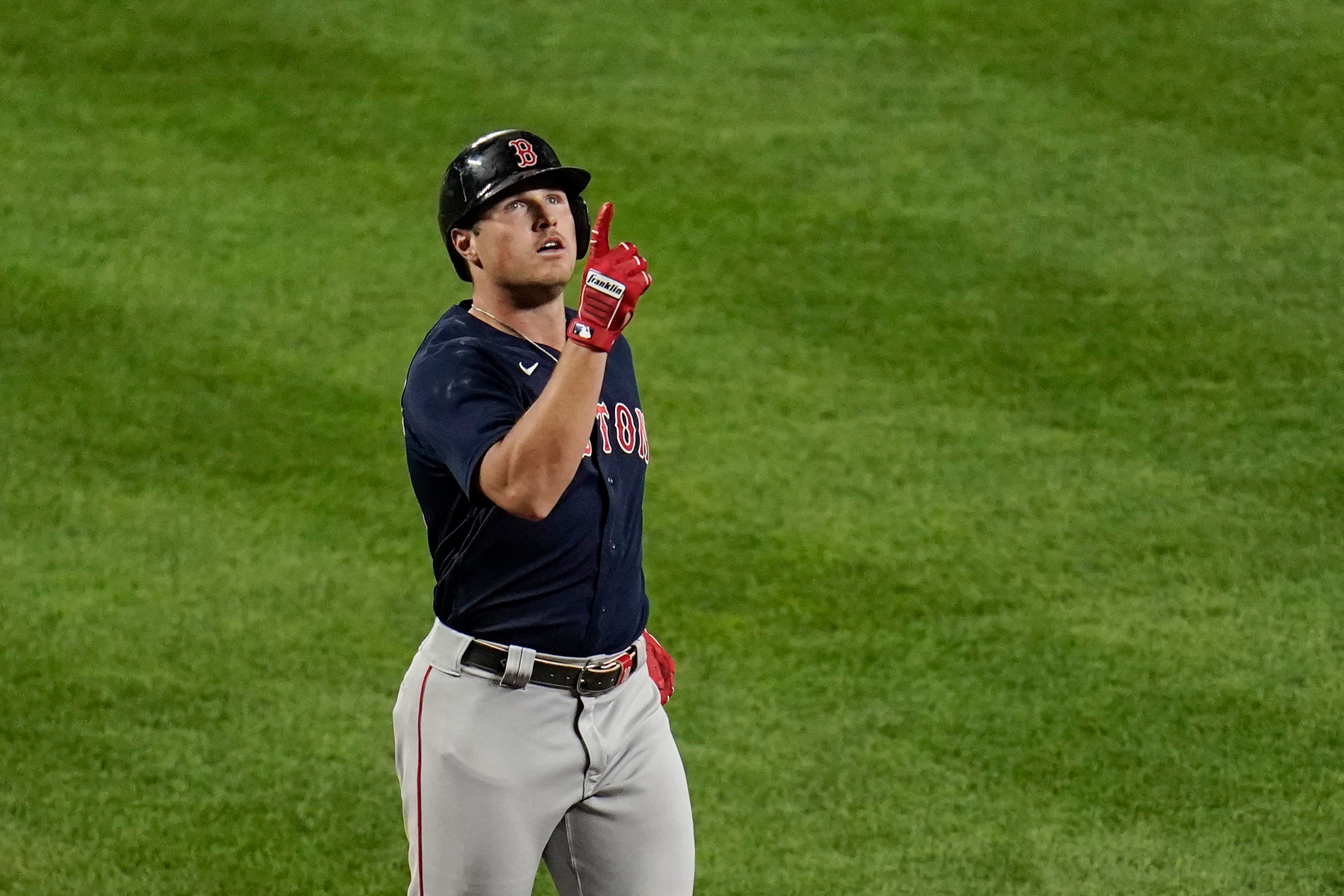 Boston Red Sox's Hunter Renfroe gestures before crossing the plate after hitting a solo home run off Baltimore Orioles starting pitcher Spenser Watkins during the ninth inning of a baseball game, Wednesday, Sept. 29, 2021, in Baltimore. (AP Photo/Julio Cortez)
