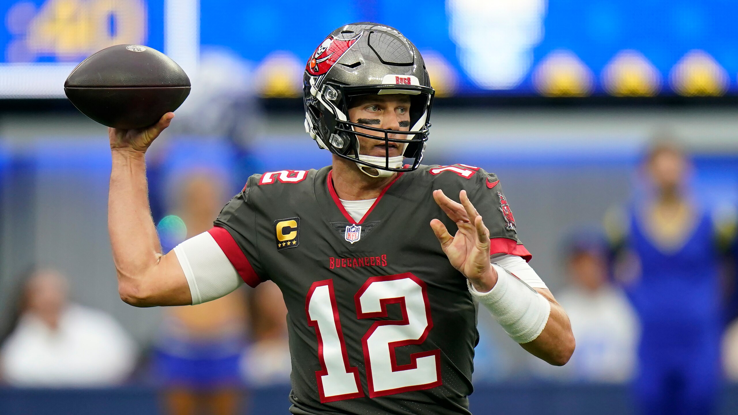Tampa Bay Buccaneers quarterback Tom Brady passes during an NFL football game against the Los Angeles Rams Sunday, Sept. 26, 2021, in Inglewood, Calif. (AP Photo/Jae C. Hong) Tampa Bay Buccaneers quarterback Tom Brady passes during an NFL football game against the Los Angeles Rams Sunday, Sept. 26, 2021, in Inglewood, Calif. (AP Photo/Jae C. Hong)